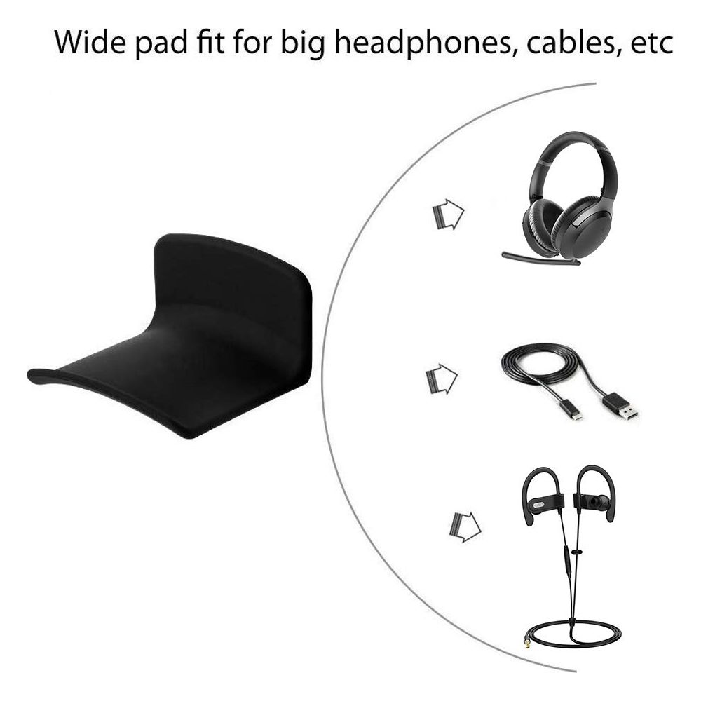 Support noir pour casque avec casque, câbles et écouteurs.