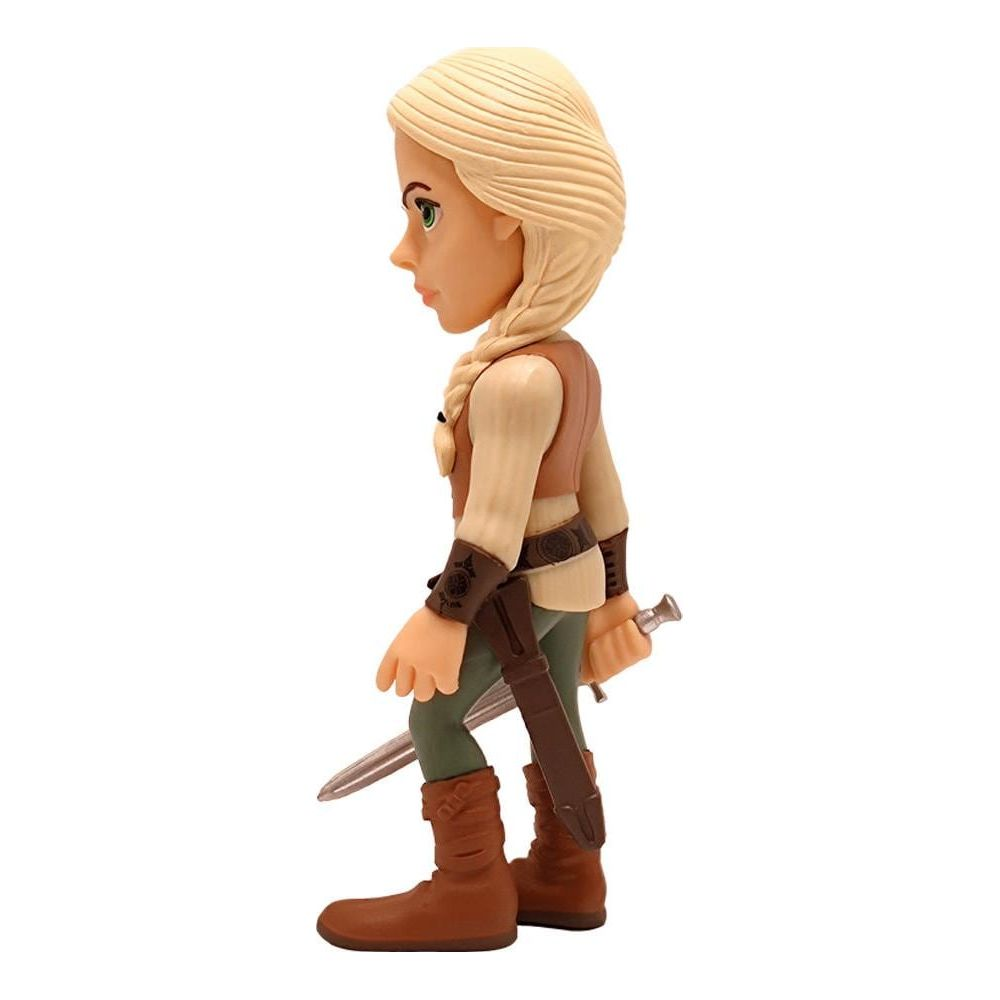 Eine Figur mit blonden Haaren, die ein Schwert hält und braune Stiefel trägt.