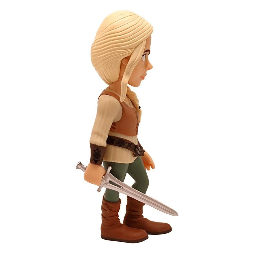 Eine Figur mit blondem Haar und braunen Stiefeln hält ein Schwert.