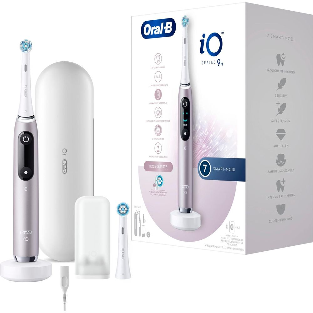 Różowo-złota szczoteczka elektryczna Oral-B iO Series 9N z akcesoriami.