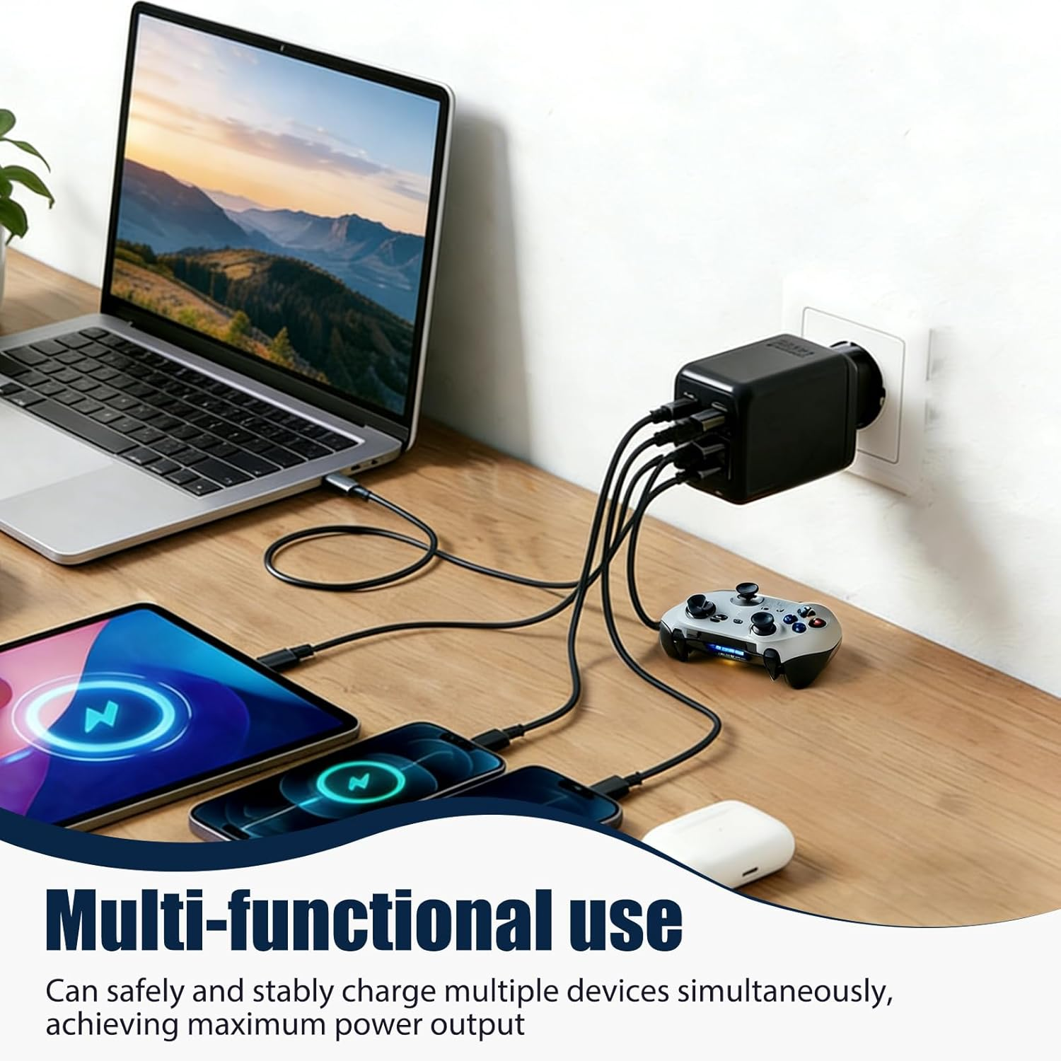 Ladegerät mit mehreren Anschlüssen lädt Laptop, Tablet, Handy, Controller und AirPods.