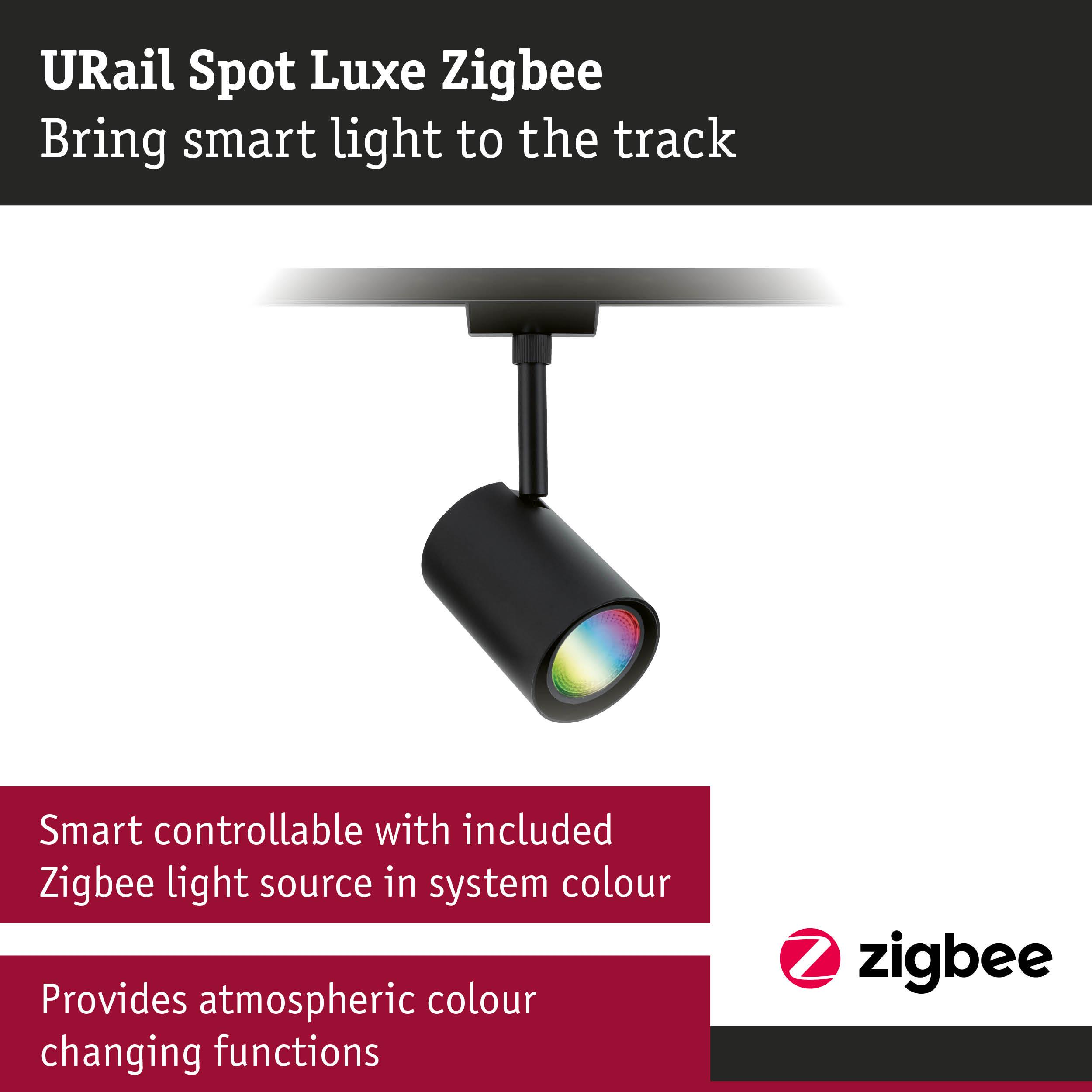 Czarny reflektor szynowy z efektem tęczy, zamontowany na szynie.