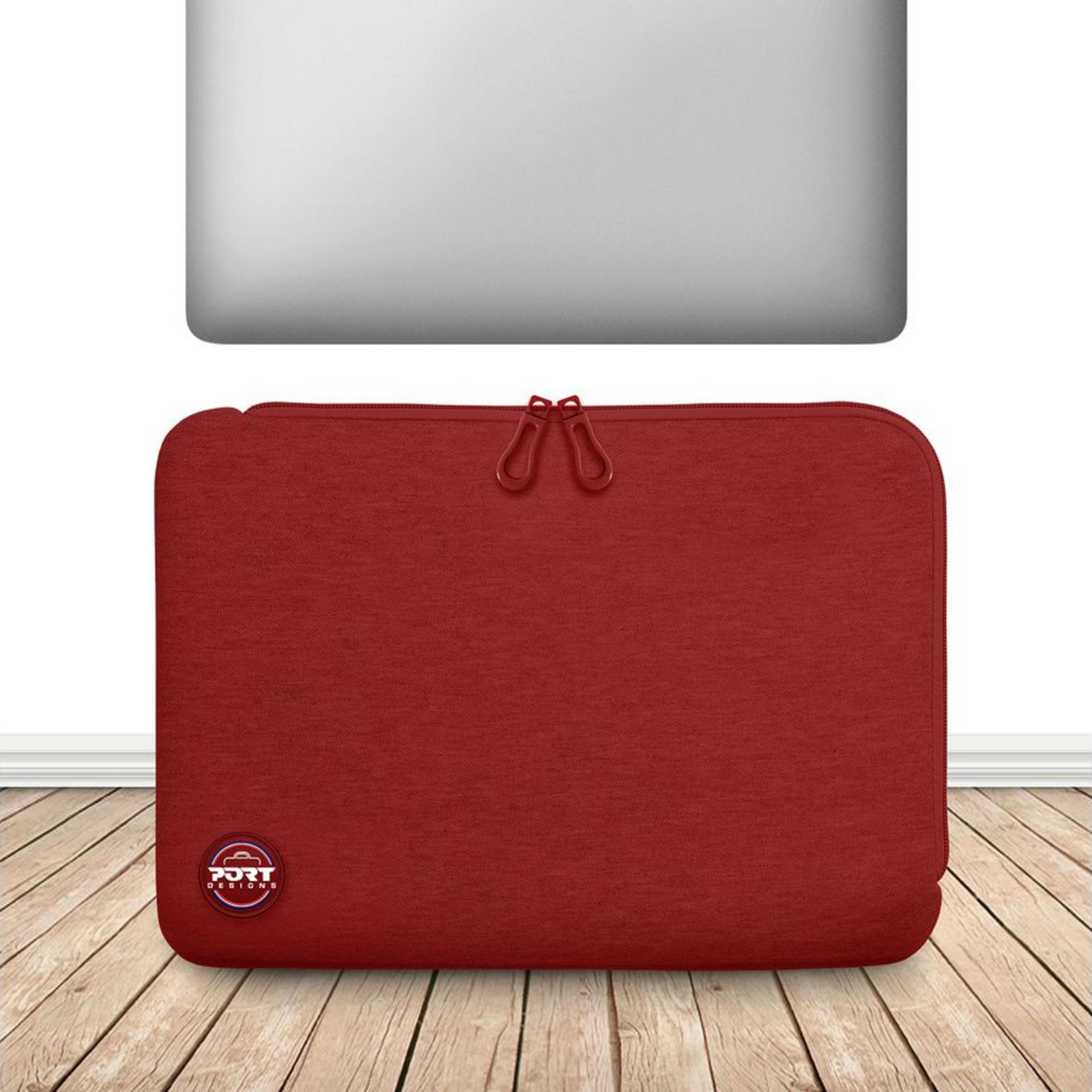 Funda roja para portátil con dos tiradores de cremallera sobre suelo de madera.