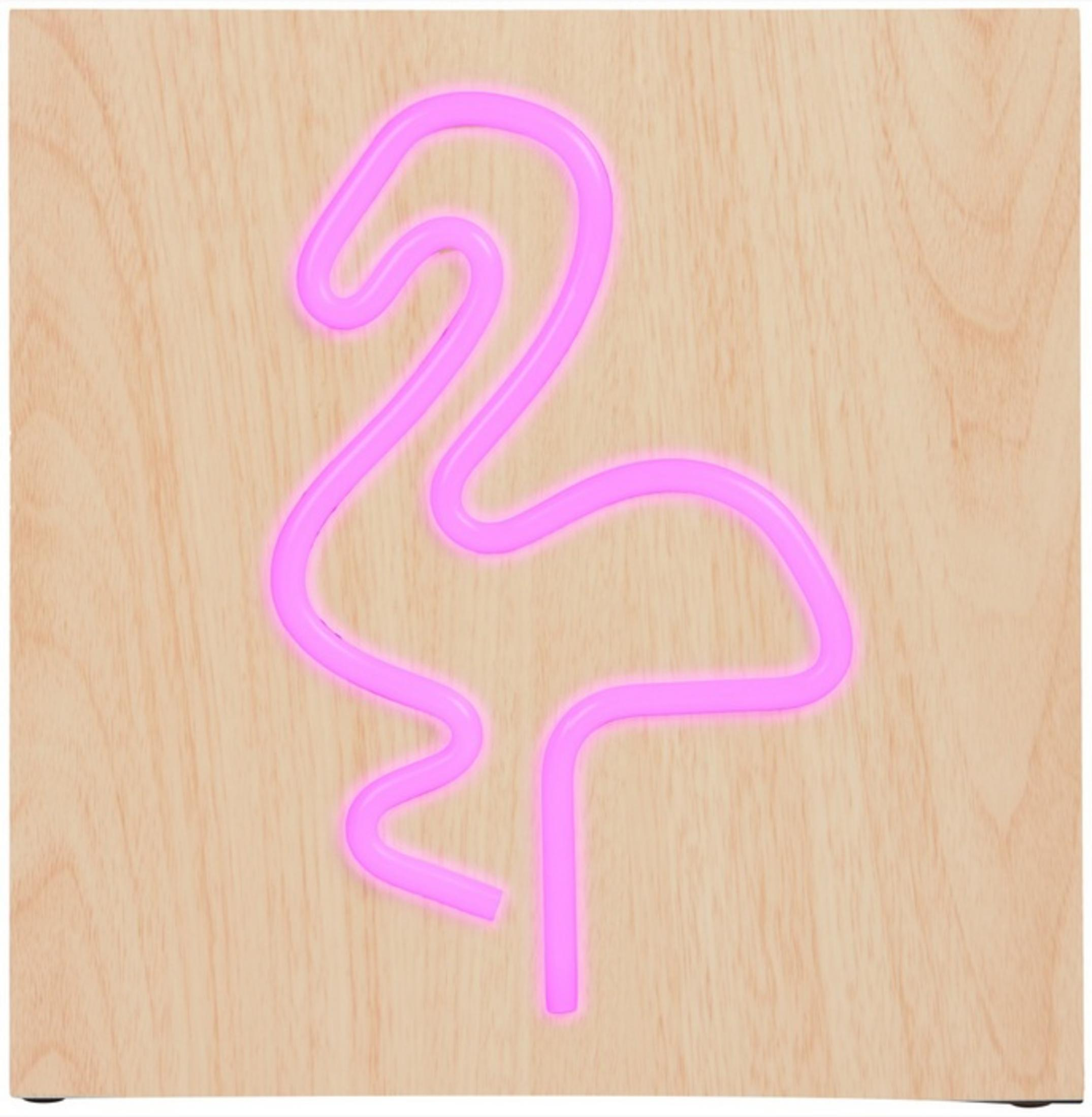 Ein rosa Neon-Flamingo auf einer Holzoberfläche.