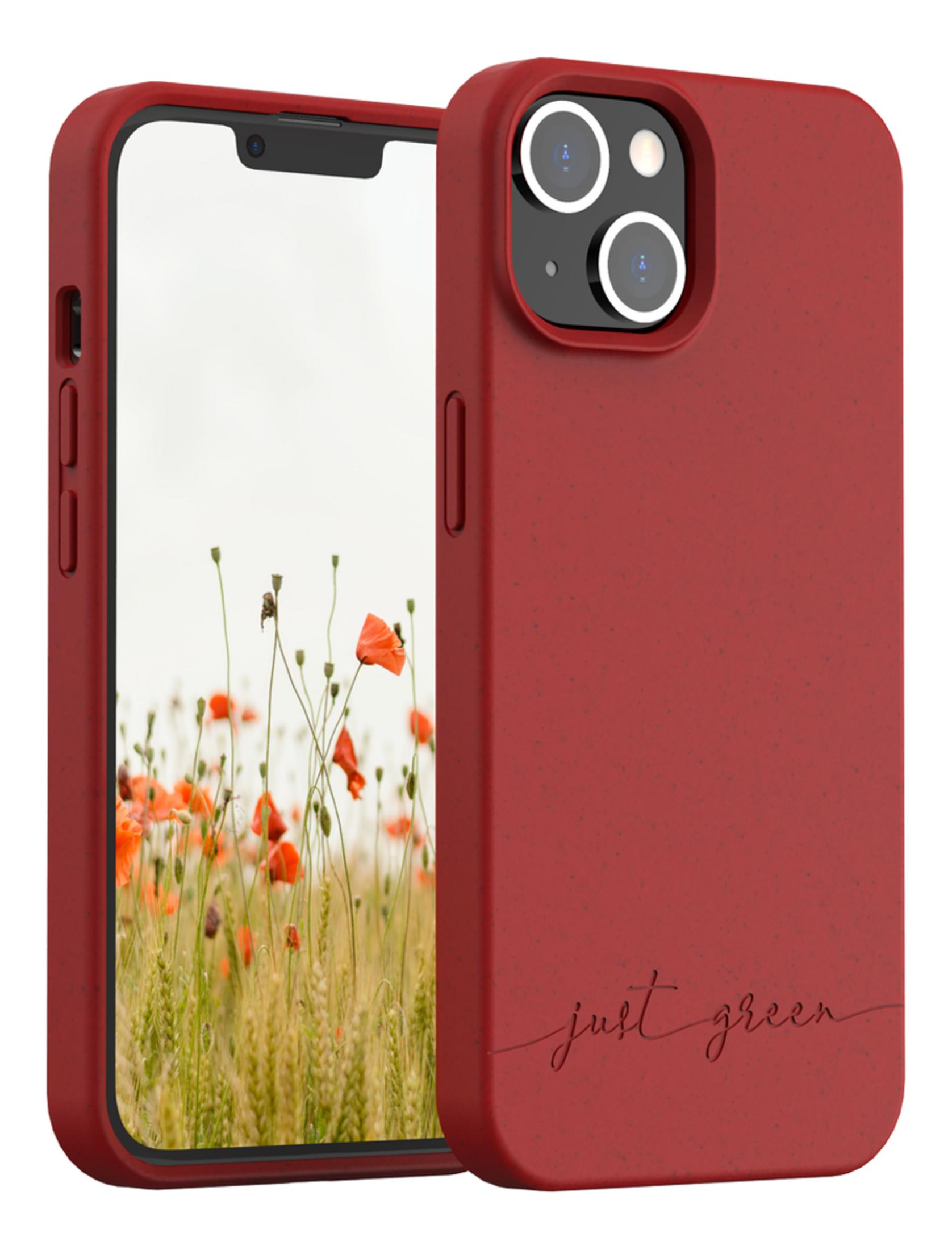 Custodia rossa con scritta "just green" e telefono con campo di papaveri.