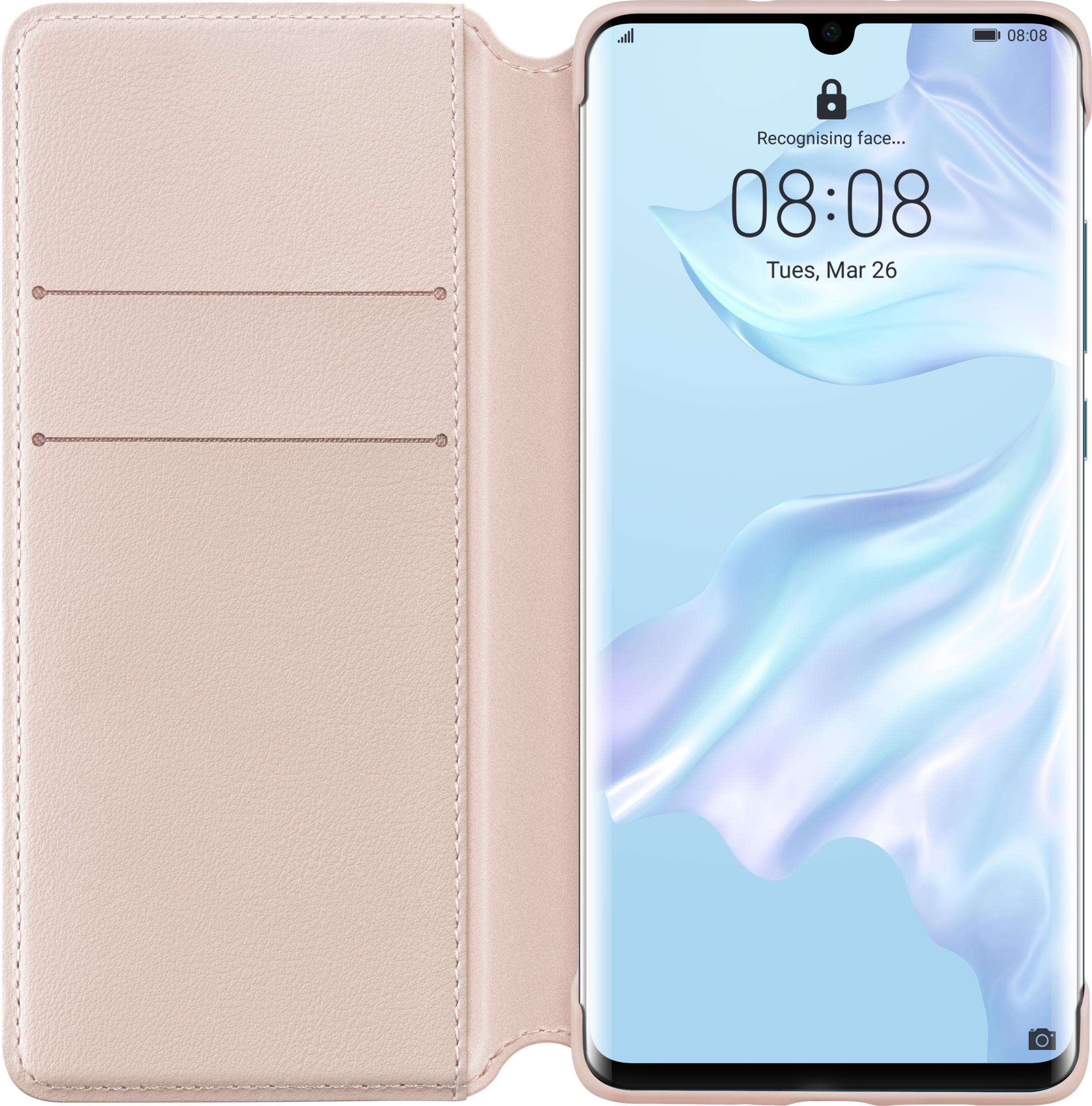 Una custodia rosa chiaro accanto a uno smartphone con schermo bloccato.