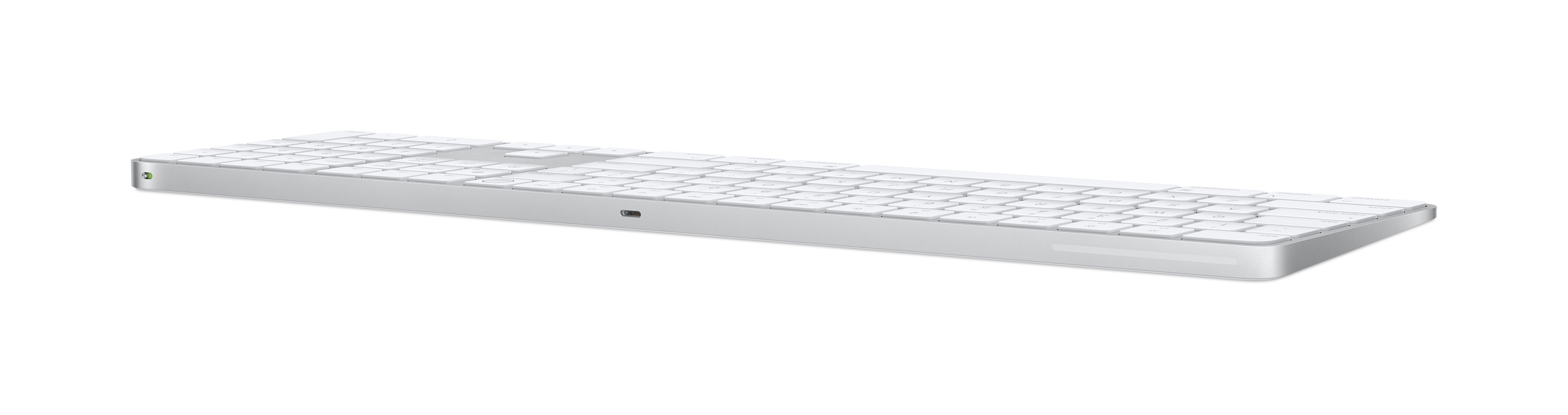 A silver keyboard with white keys, close-up, on a white background.