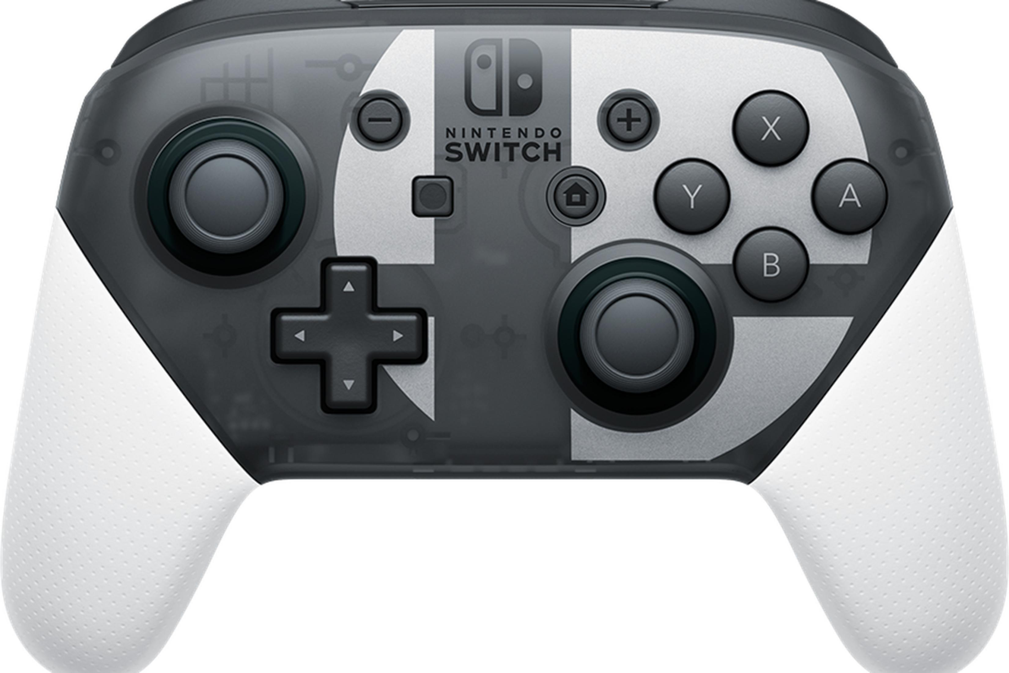 Szary kontroler Nintendo Switch Pro z białymi uchwytami i półprzezroczystą obudową.