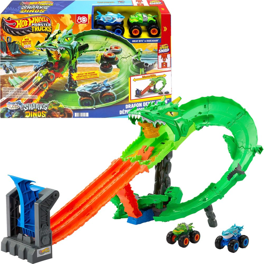 Zestaw Hot Wheels Monster Trucks z zielonym smokiem i czerwonymi rampami.
