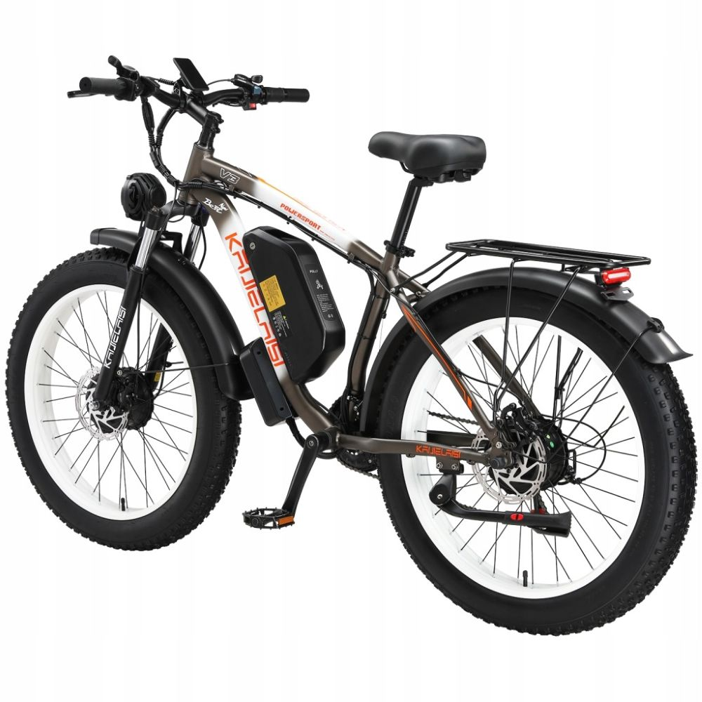 Una e-fat bike marrone con pneumatici spessi, sella nera e portapacchi.