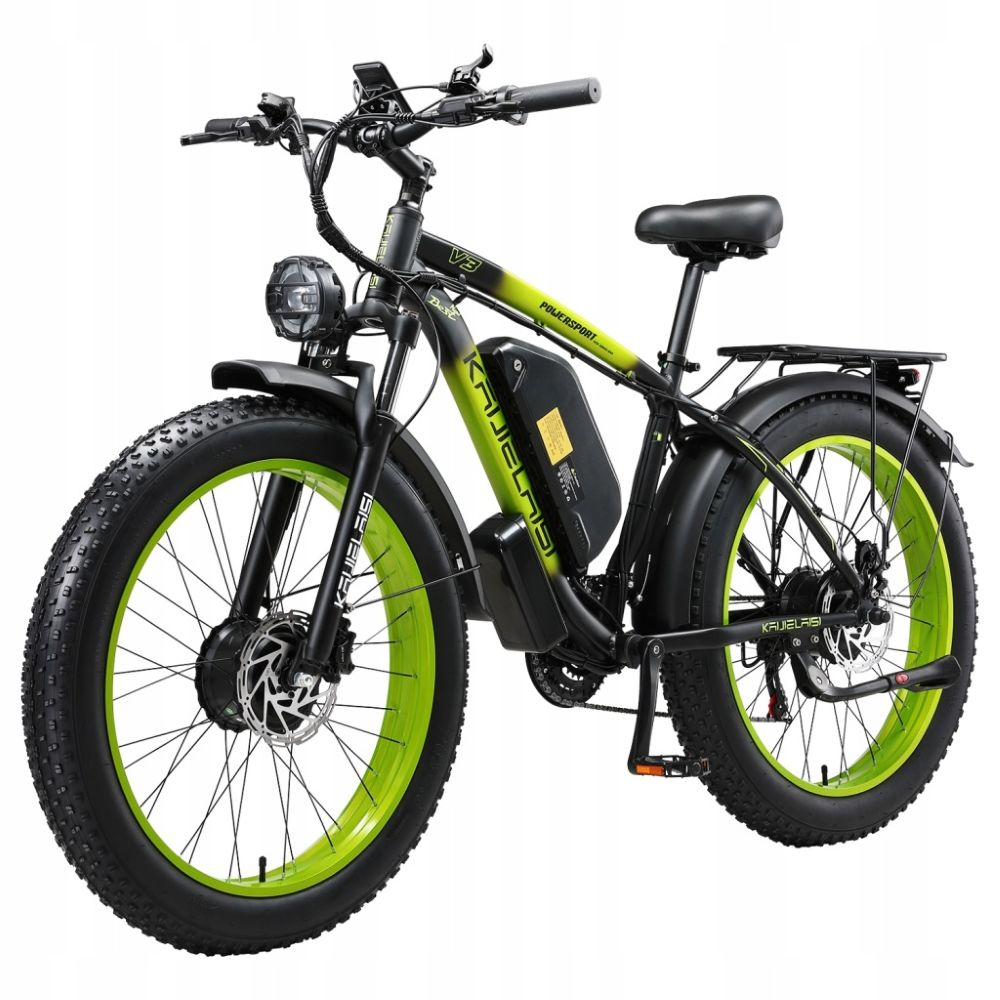 Bici elettrica nera con copertoni larghi, cerchi verdi, portapacchi e batteria.