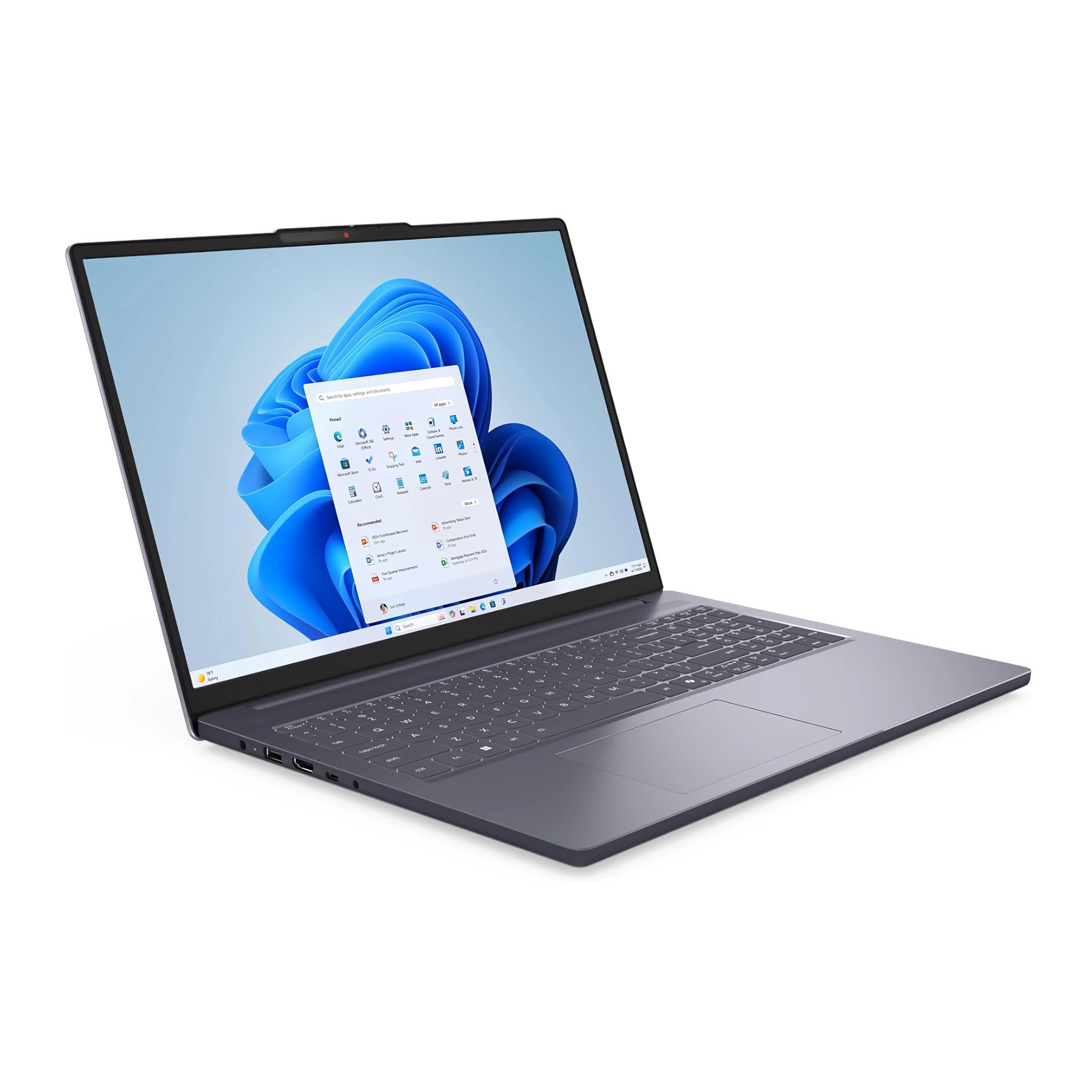Grauer Laptop mit geöffnetem Windows 11 Startmenü und blauer Wellen-Hintergrundgrafik.