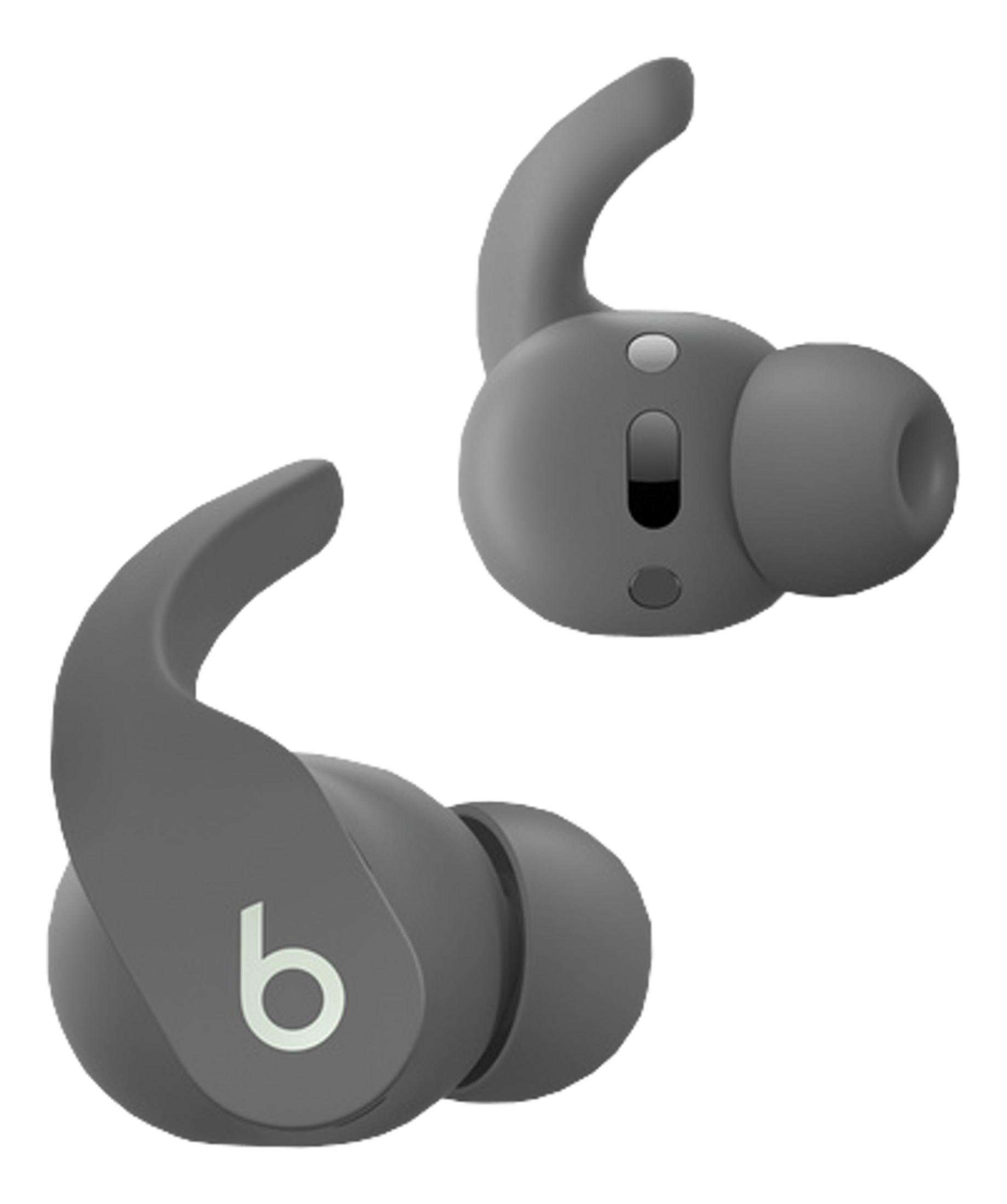 Dwa szare słuchawki Beats z logo "b" na białym tle.