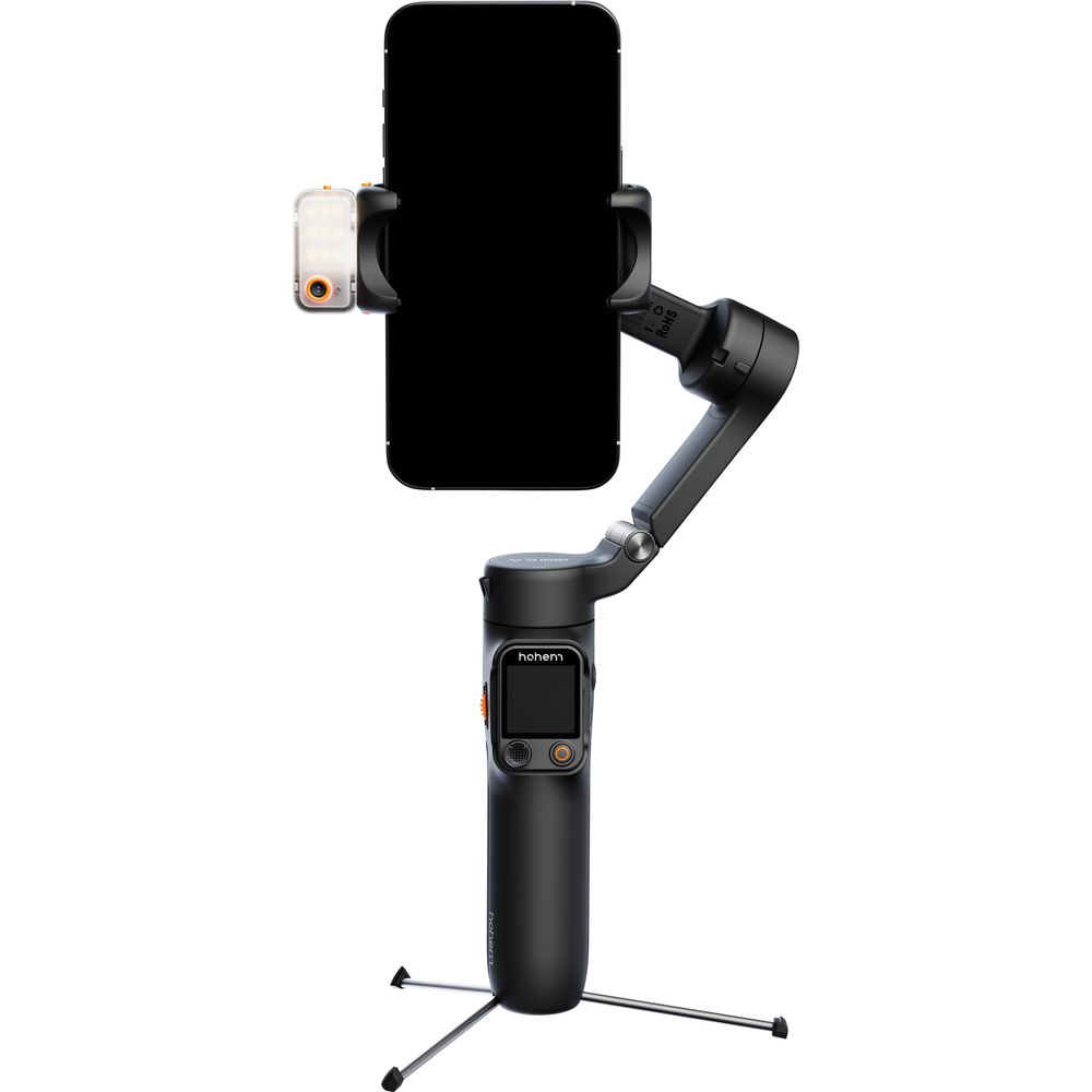 Un cardan noir pour smartphone avec téléphone, petite lumière et base trépied.