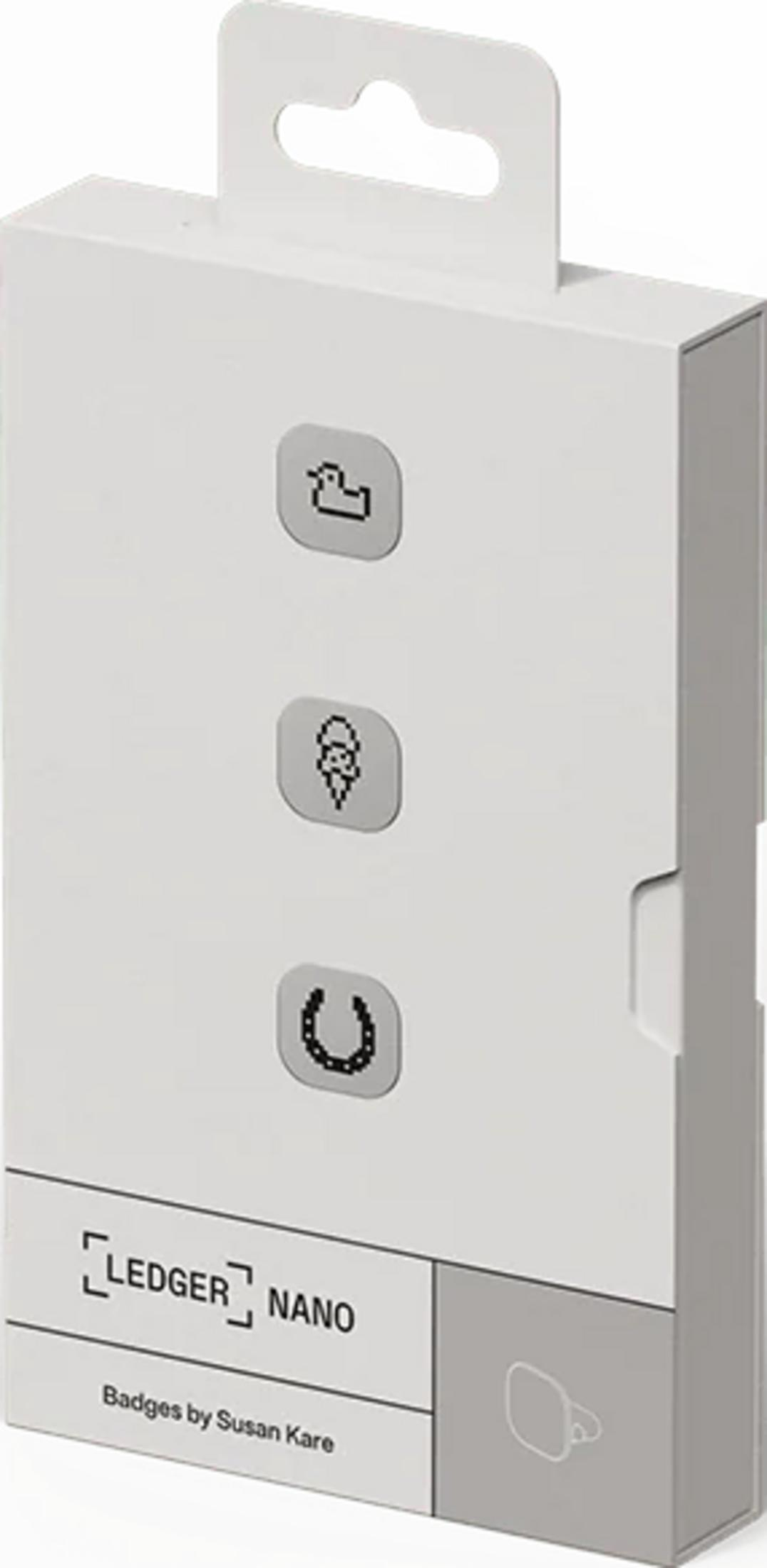 Boîte blanche avec trois icônes : canard, glace, fer à cheval. Logo Ledger Nano.