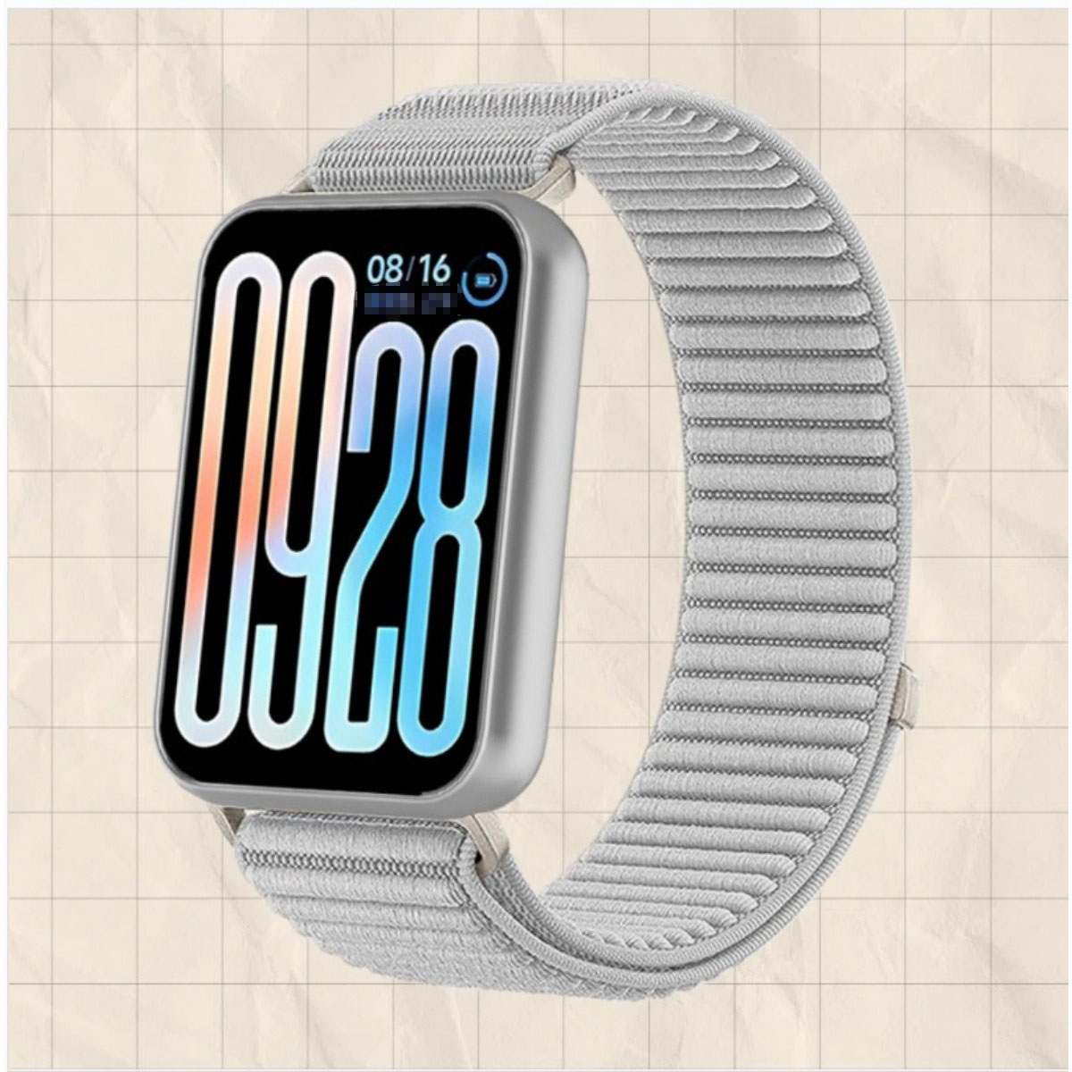 Eine graue Smartwatch mit einem Stoffarmband und einer digitalen Zeitanzeige.