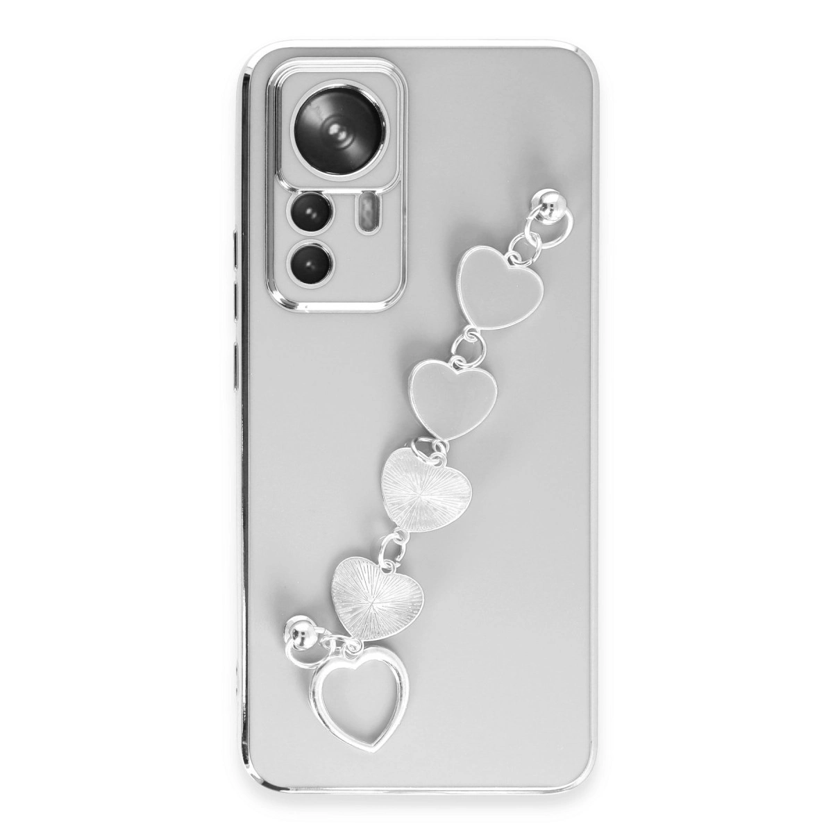 Kalp bileklikli gümüş telefon.