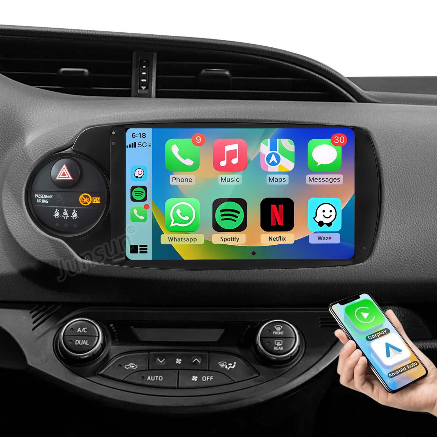System infotainment samochodu wyświetlający aplikacje smartfona: Telefon, Muzyka, Mapy i Wiadomości.