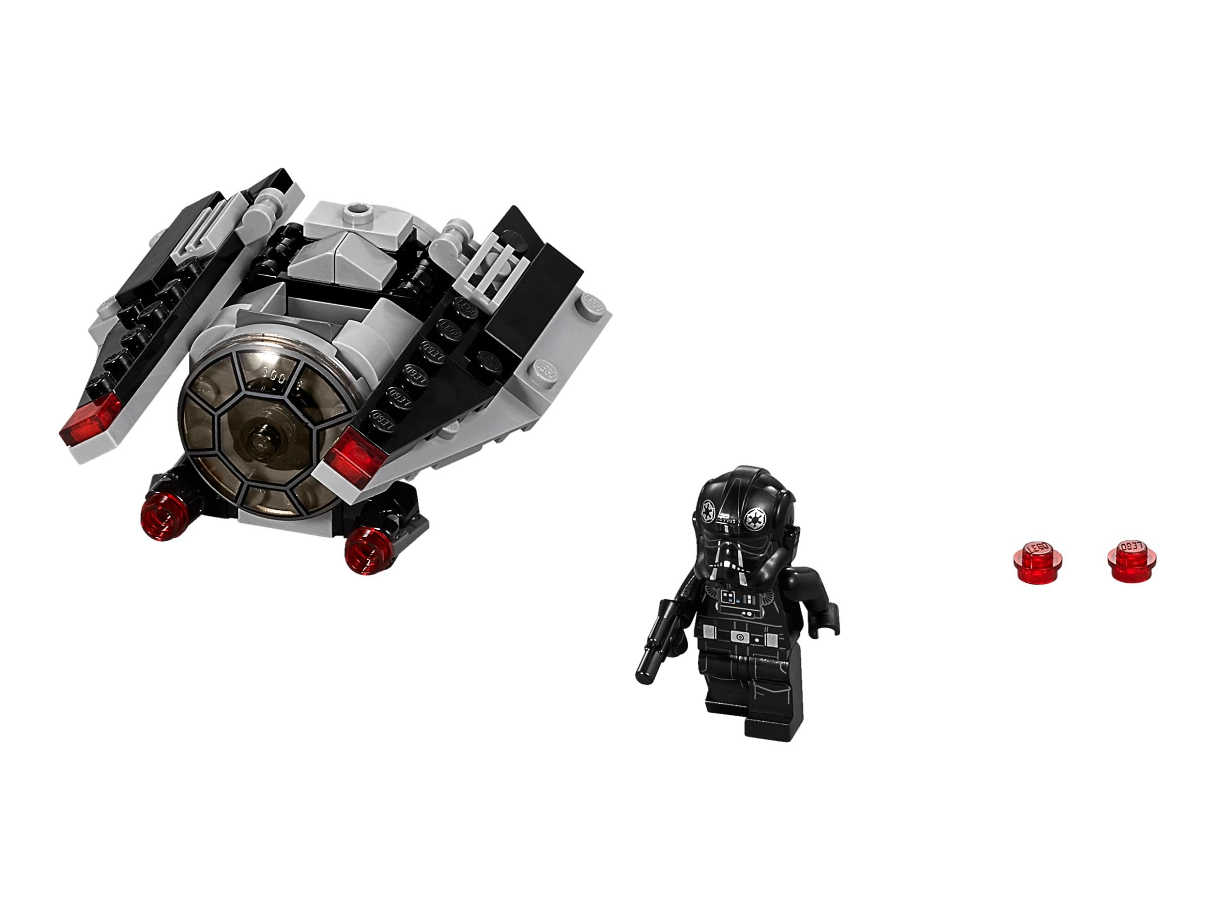 Ein graues Lego-Raumschiff mit schwarzer Figur und roten Lego-Stücken.