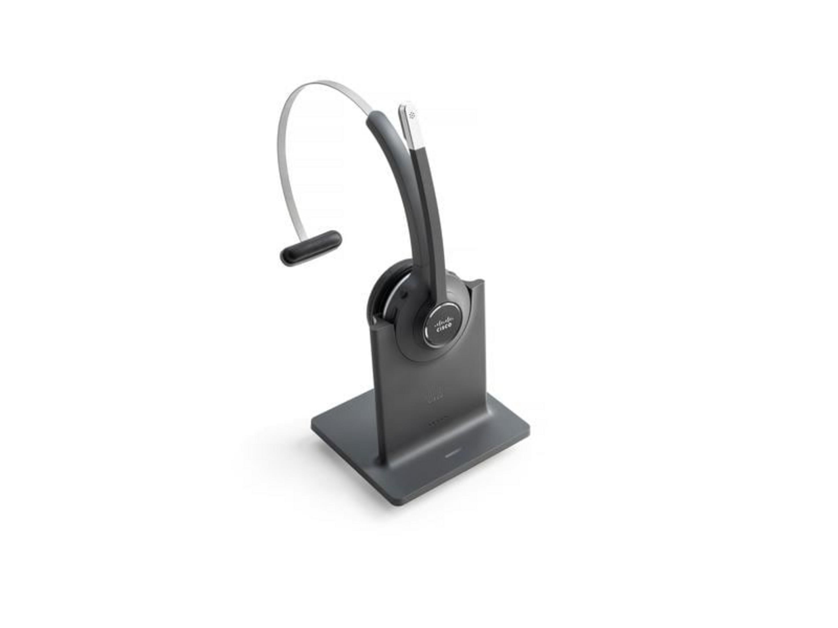 Un auricolare Cisco grigio con microfono su una base di ricarica.
