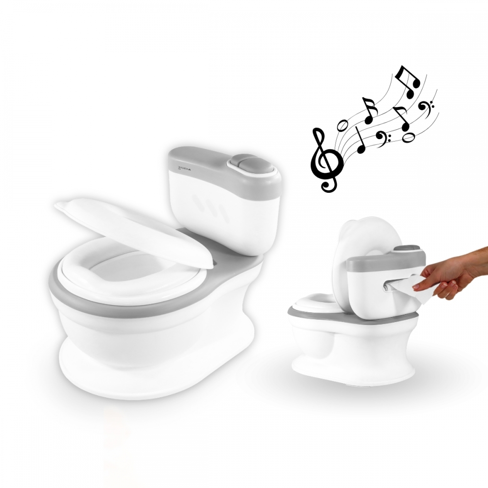 Un orinal infantil blanco y gris con notas musicales y una mano sacando papel.
