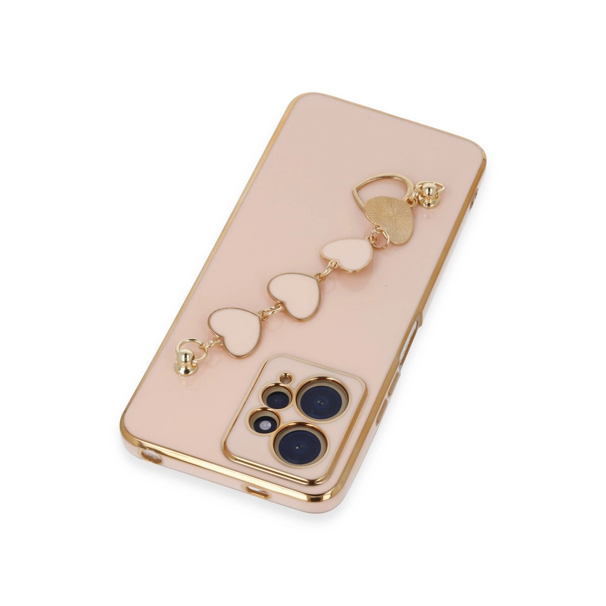 Altın süslemeli, kalp charm bileklikli pembe bir telefon.