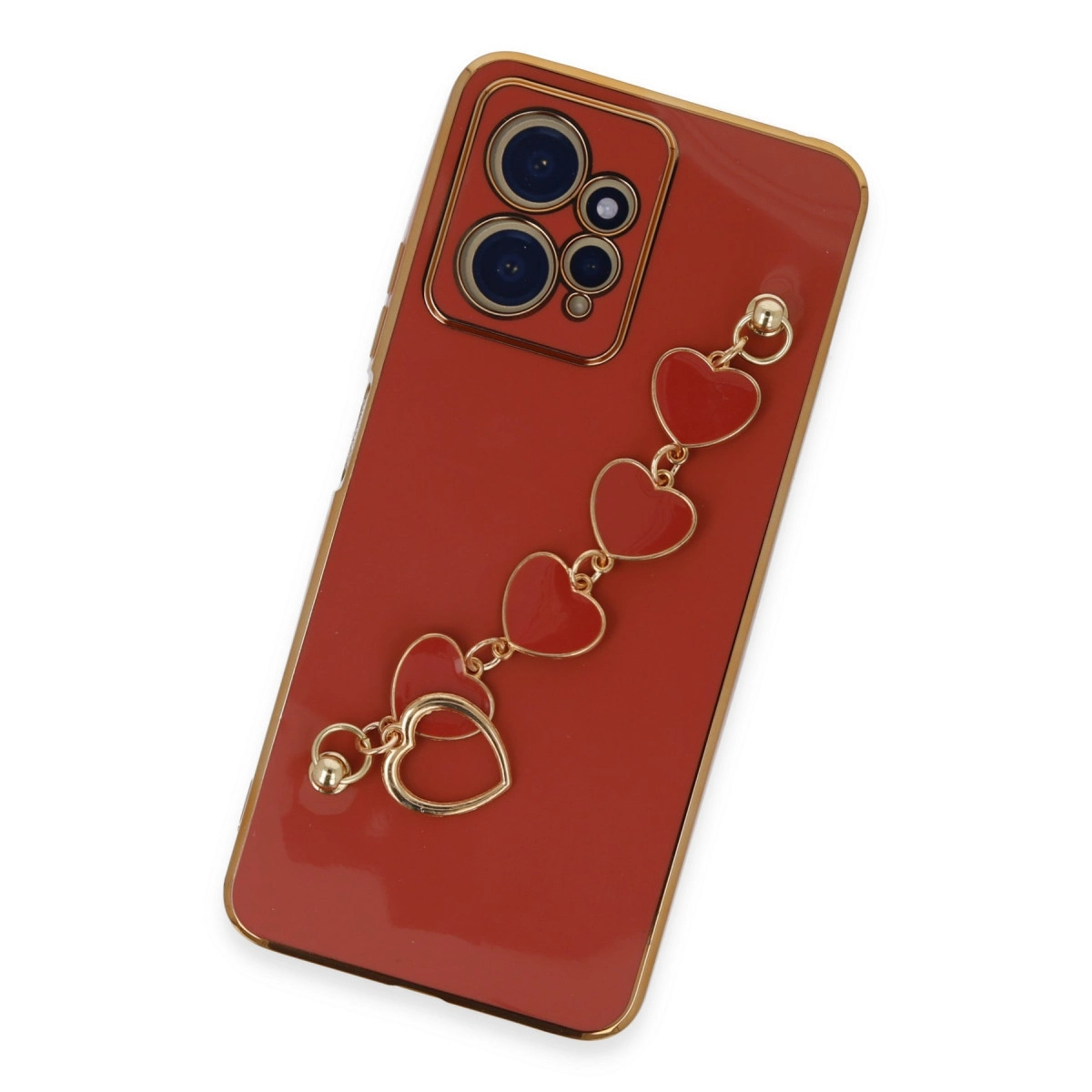 Altın çerçeveli kırmızı telefon kılıfı ve kalp şeklinde charm zinciri.