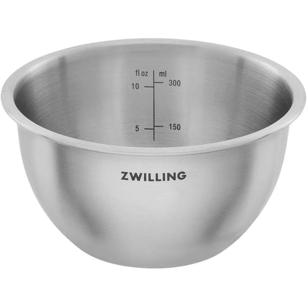 Una ciotola in acciaio inox lucida con segni di misurazione in fl oz e ml e logo ZWILLING.