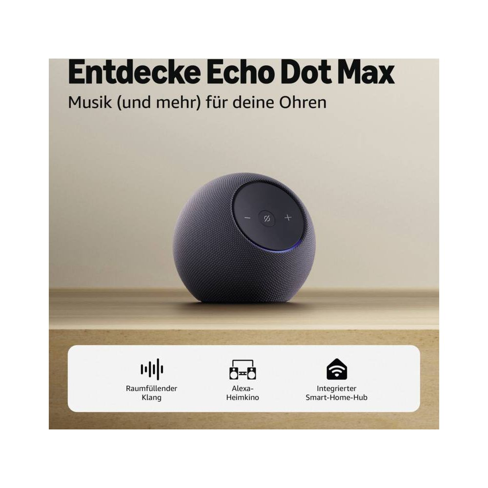 Ein grauer Echo Dot Max Lautsprecher auf einem Holztisch mit Text.
