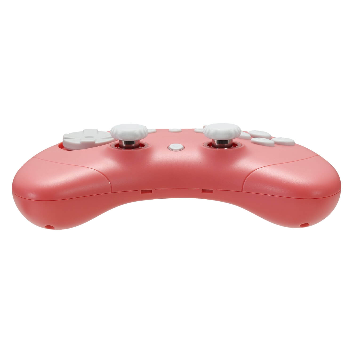 Un controlador color coral con botones y joysticks blancos, aislado en blanco.