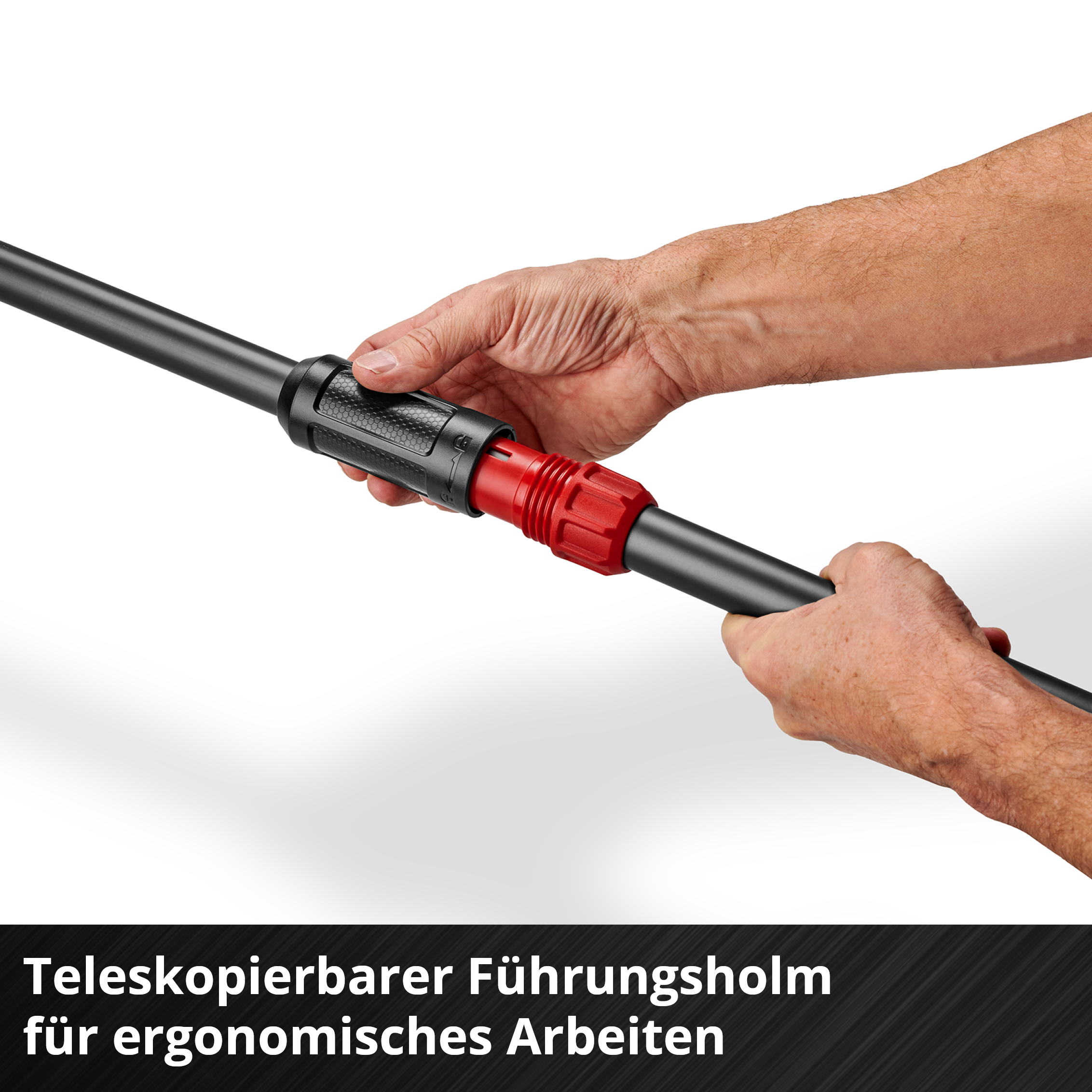 Hände passen einen roten Teleskopgriff an einem schwarzen Stab an.