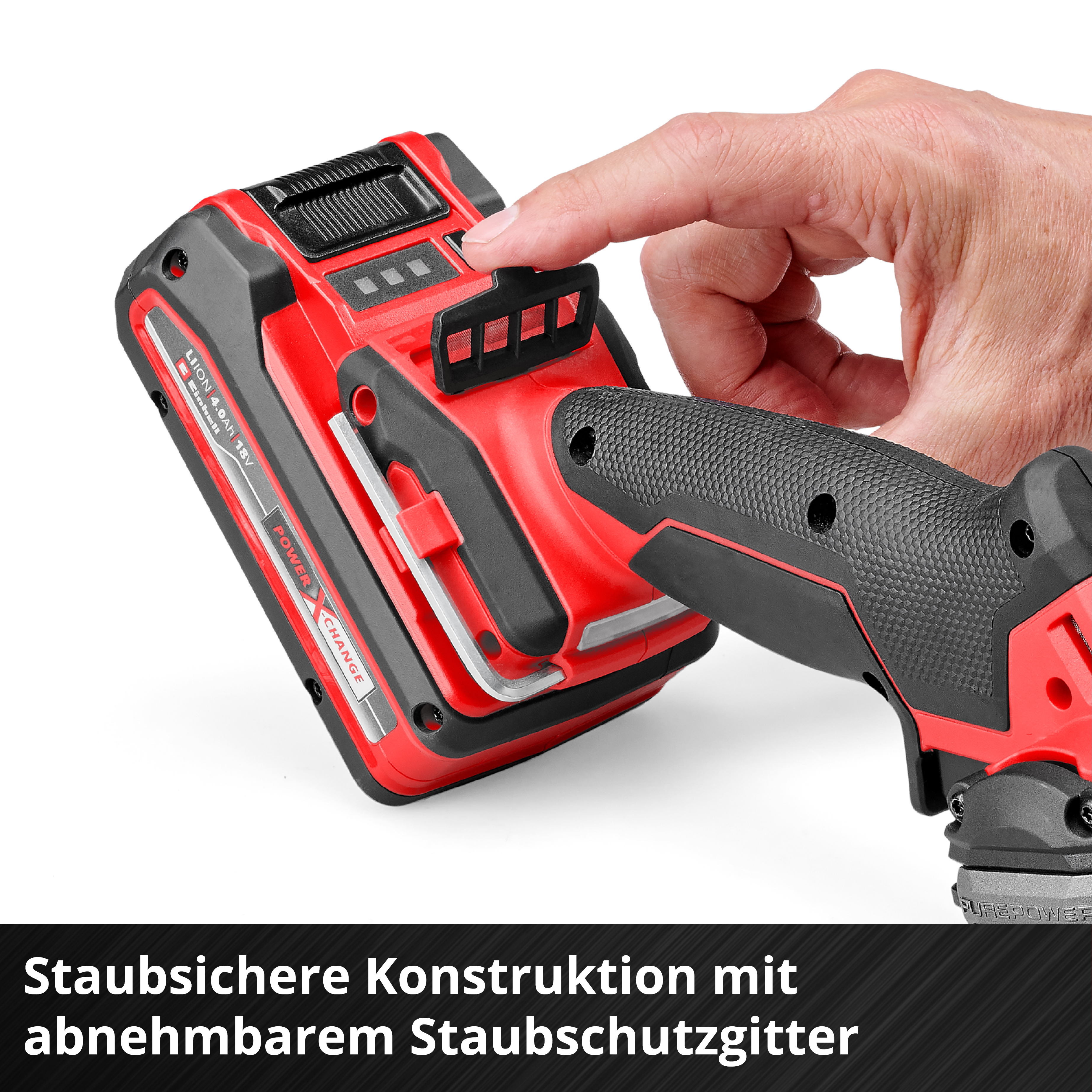 Rote und schwarze Elektrowerkzeuge mit einem Finger, der einen Knopf drückt.