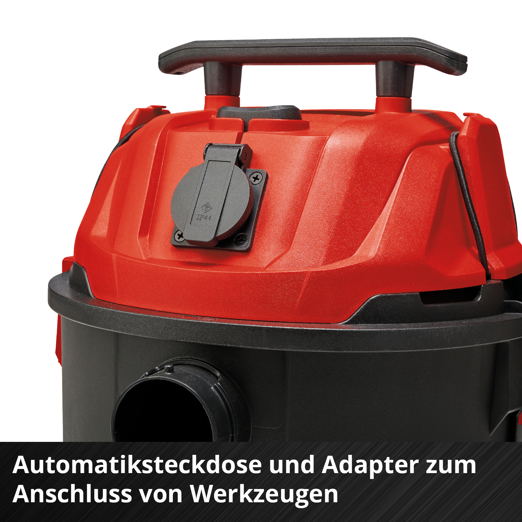 Roter Staubsauger mit schwarzem Griff und Steckdose.