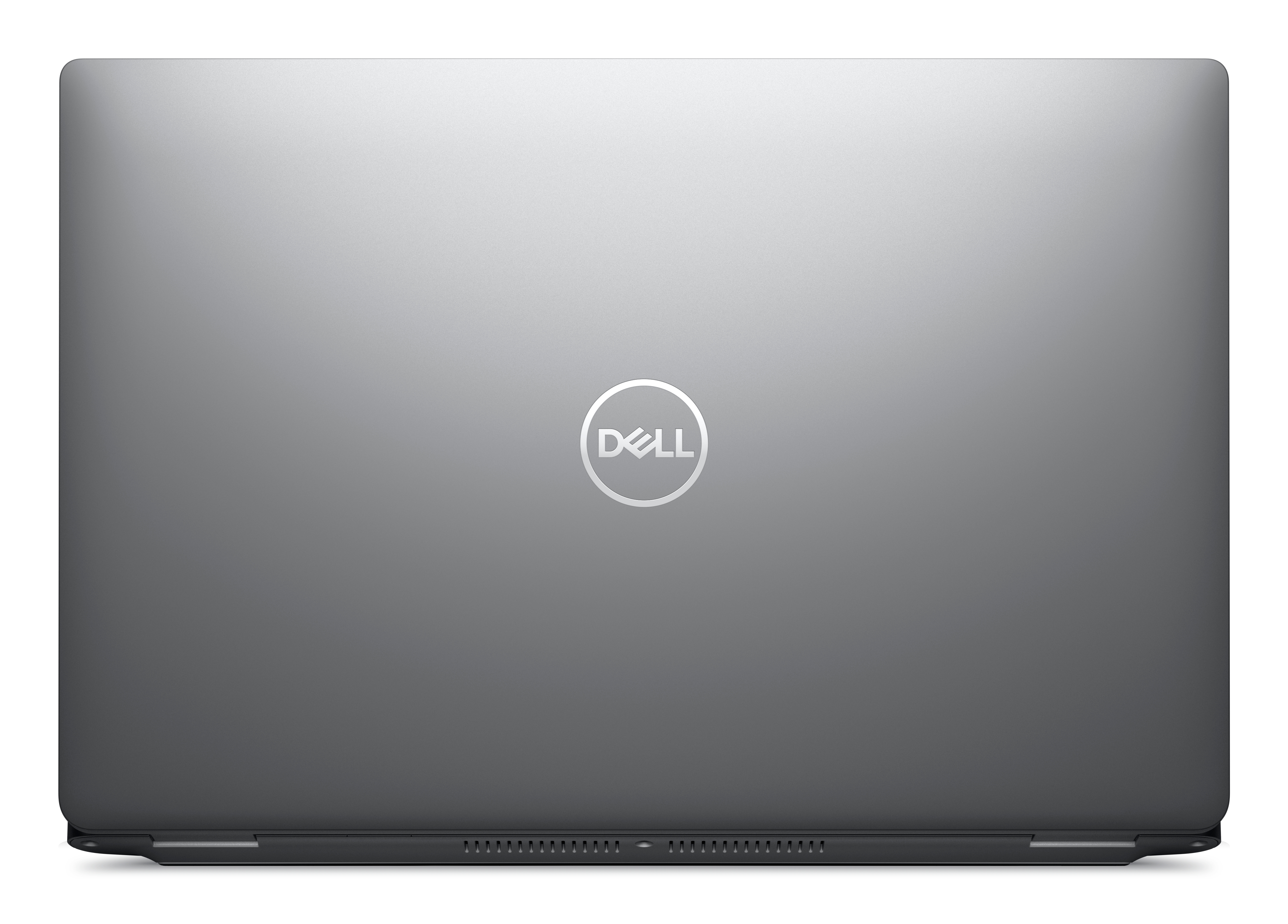 Closed silver Dell laptop with logo on top.