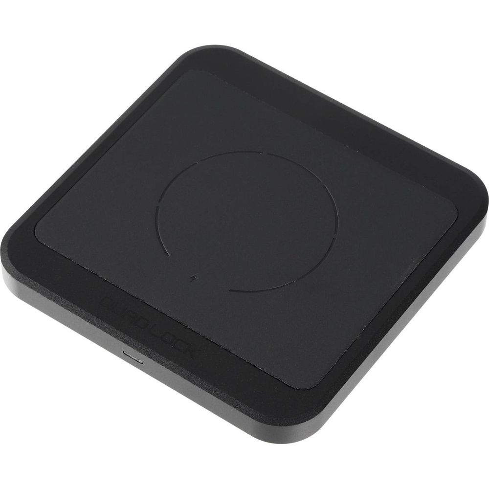 Caricatore wireless rettangolare nero con motivo circolare.