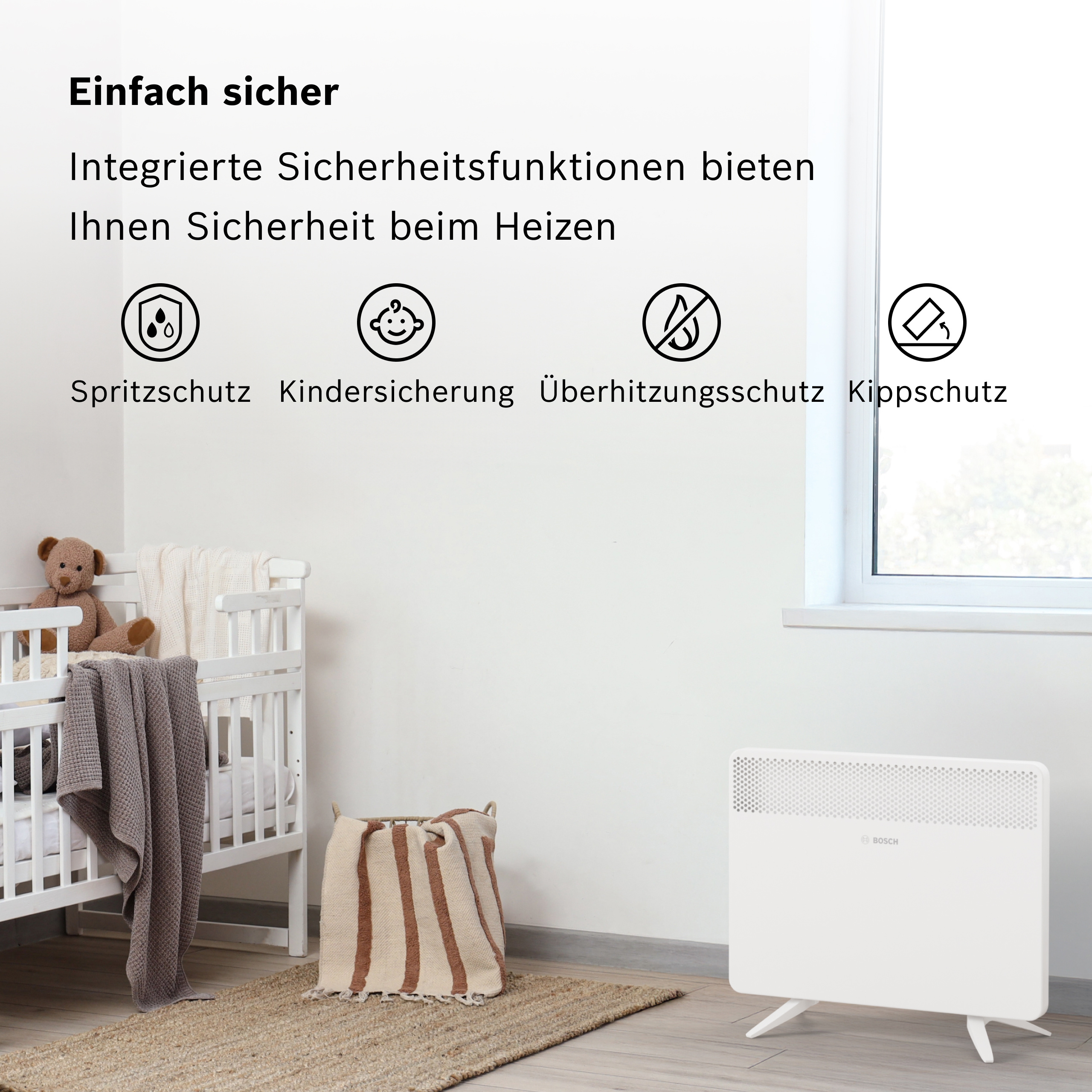 Ein weißer Heizkörper steht neben einem Kinderbett mit Teddybär und Decken.