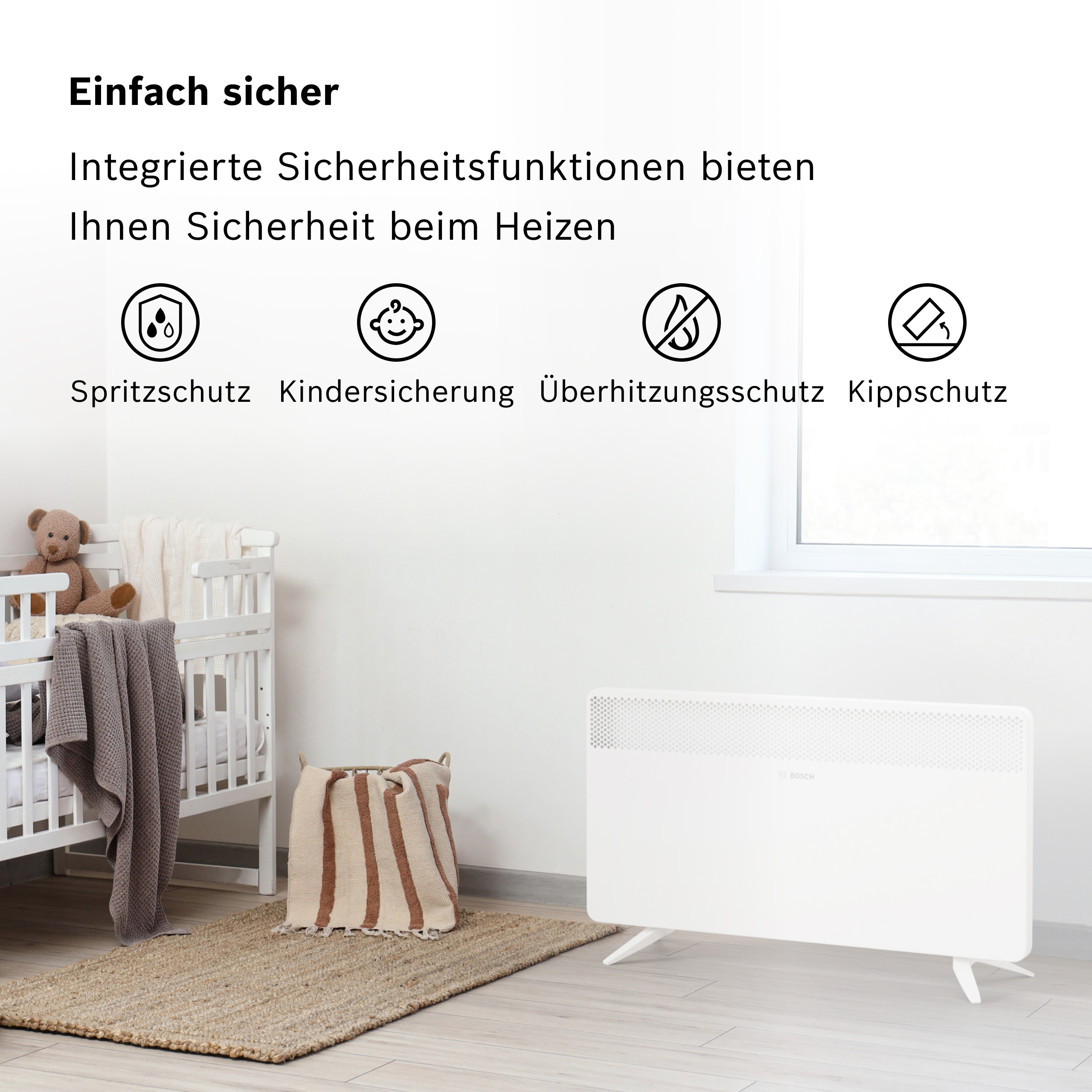 Ein weißer Heizkörper steht neben einem Kinderbett mit Teddy und Decken.