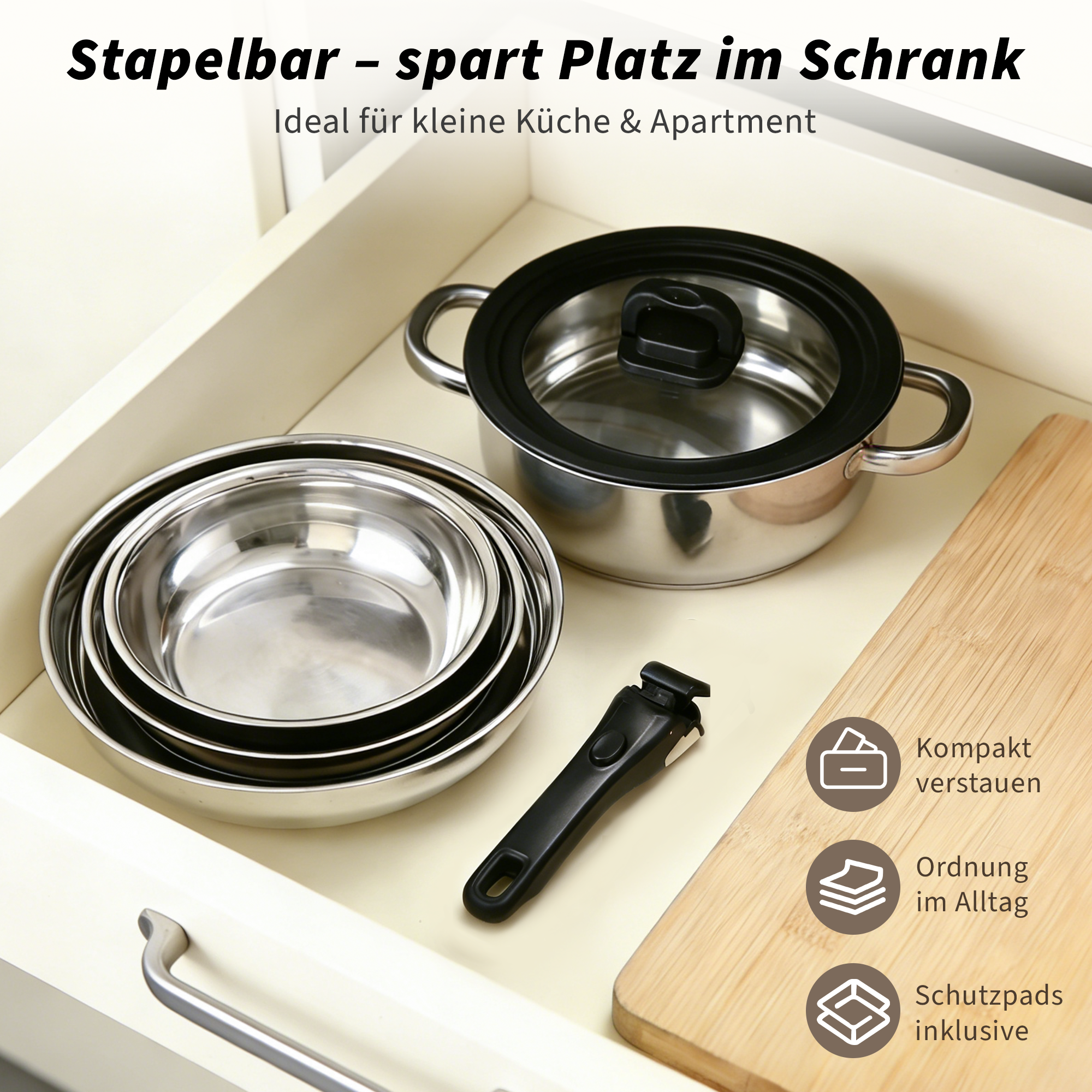 Stapelbare Kochgeschirre und ein abnehmbarer Griff in einer Schublade.