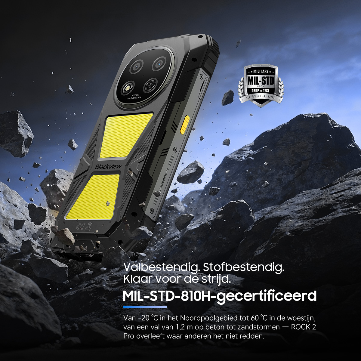 Robuuste smartphone met gele accenten, omringd door rotsen en stof.