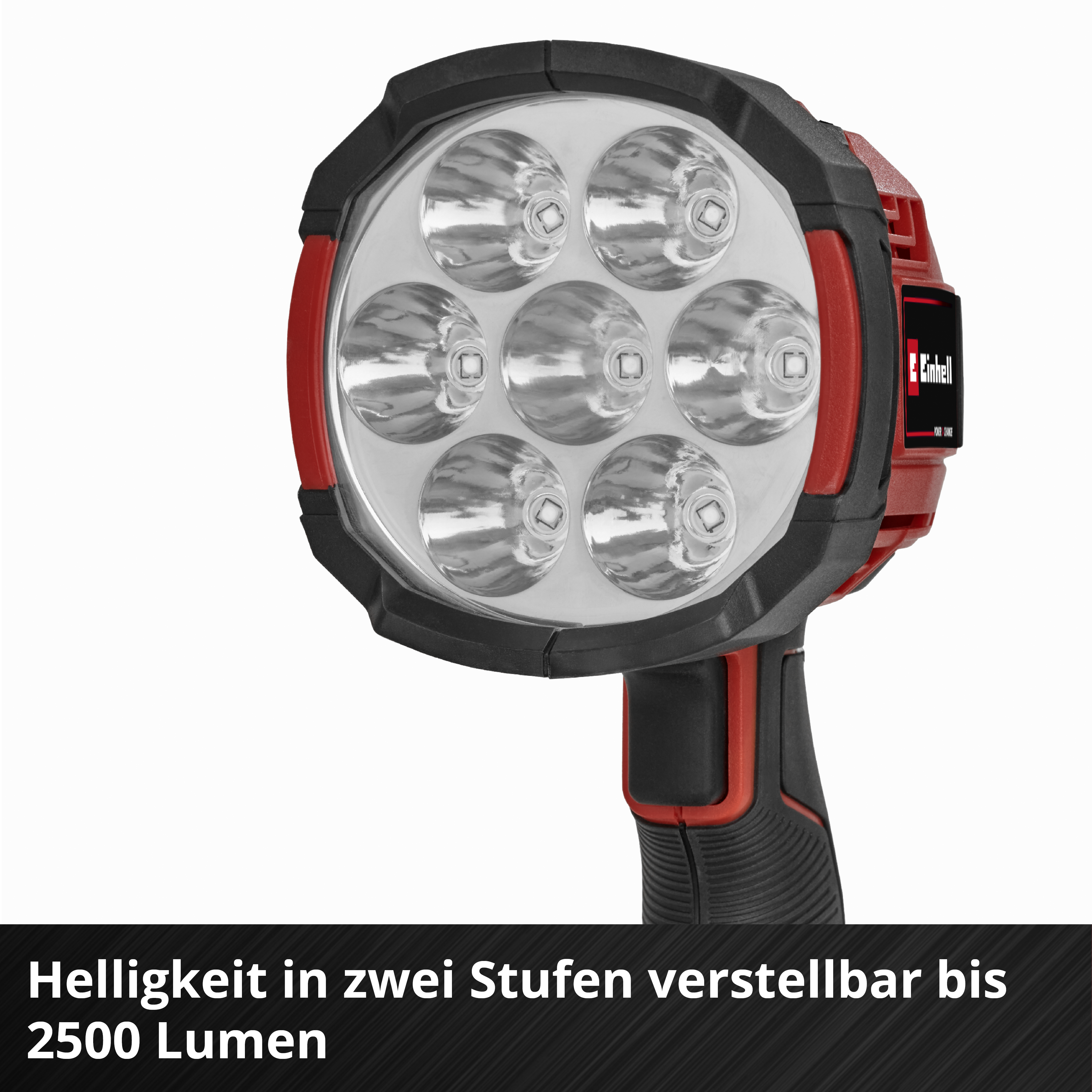Ein roter und schwarzer Strahler mit sieben LEDs und einem Griff.