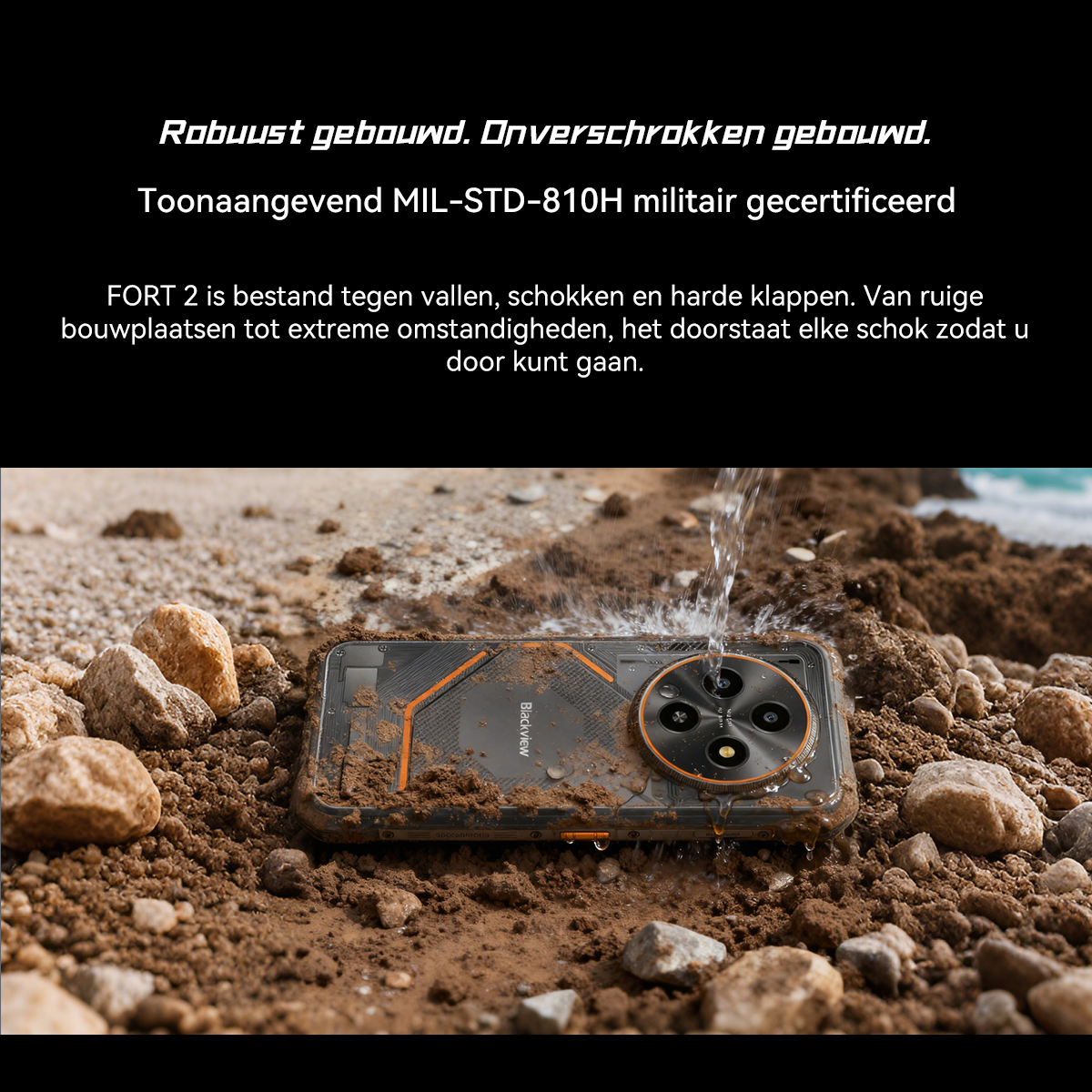 A rugged smartphone lies in muddy ground as water splashes over it.