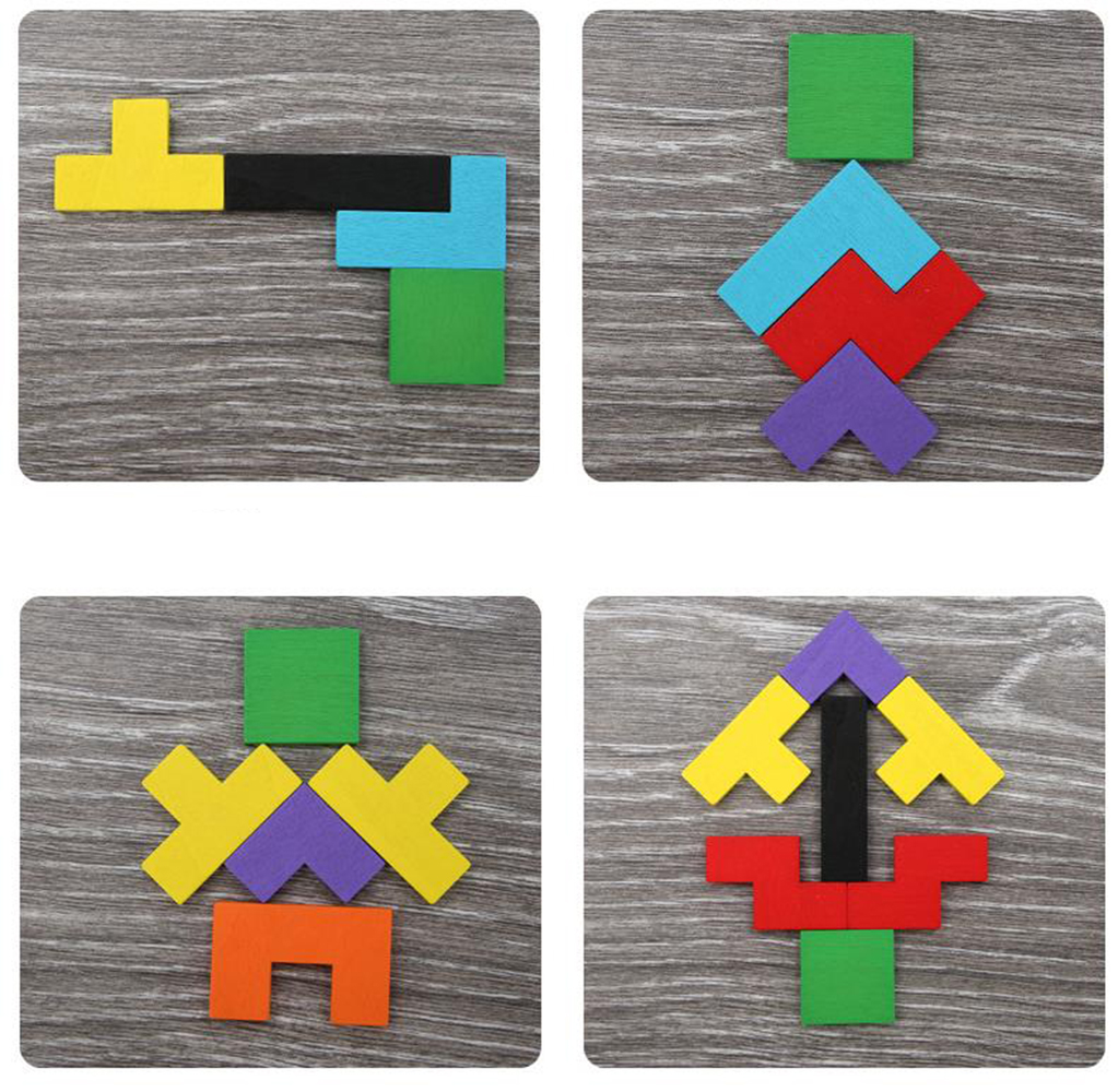 Vier Tangram-Formen auf Holzgrund.
