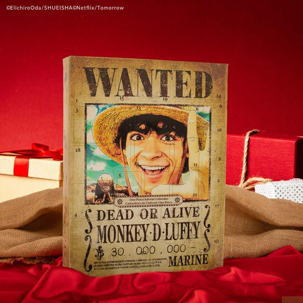 Un calendario "Wanted" di One Piece con Monkey D. Luffy, circondato da regali.