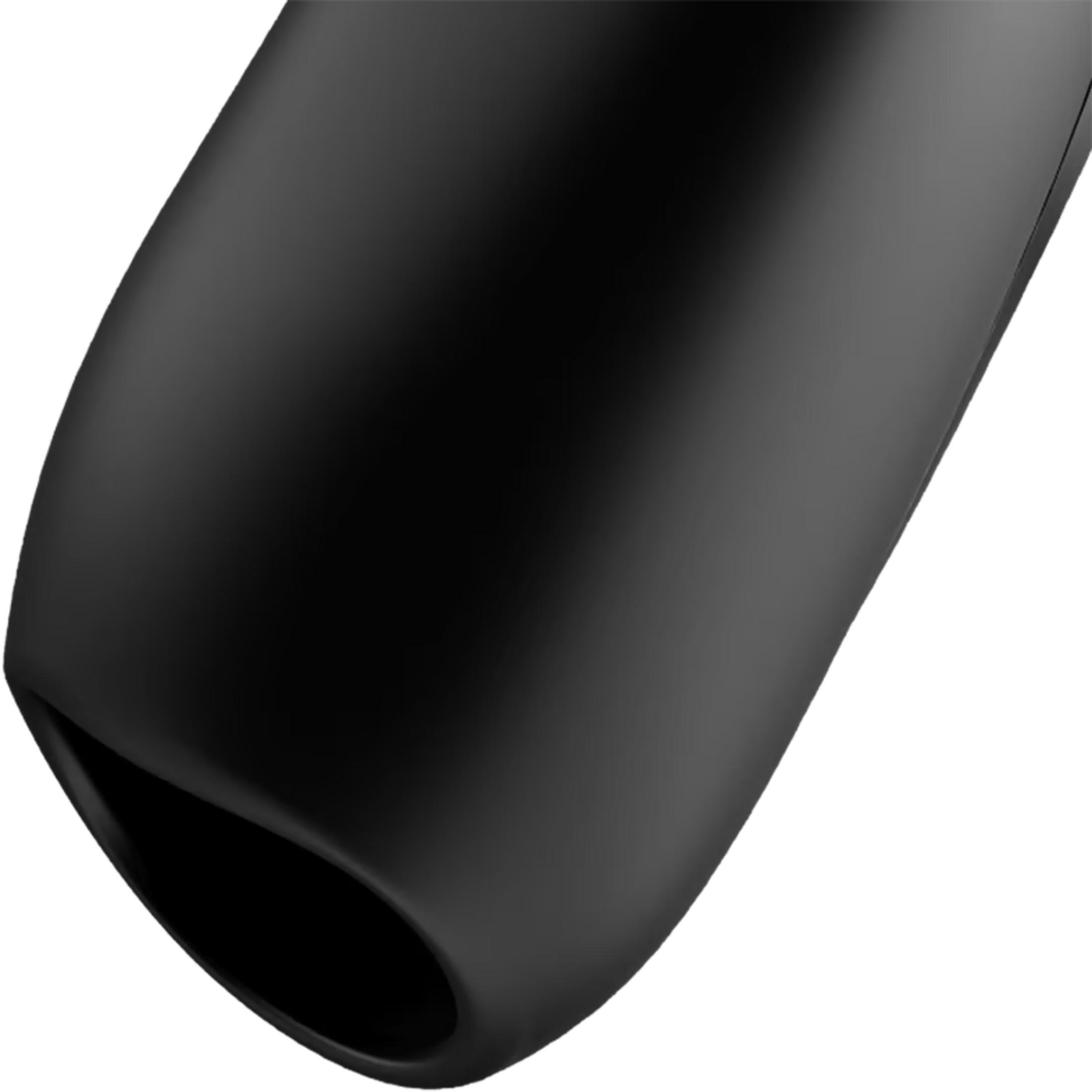 Ein schwarzes, glänzendes Objekt mit einer ovalen Öffnung.