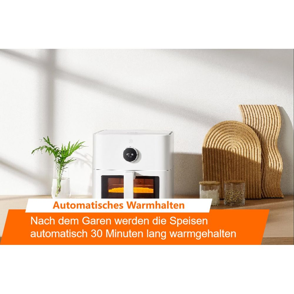 Biała podwójna frytkownica beztłuszczowa z dwoma komorami i ekranem.