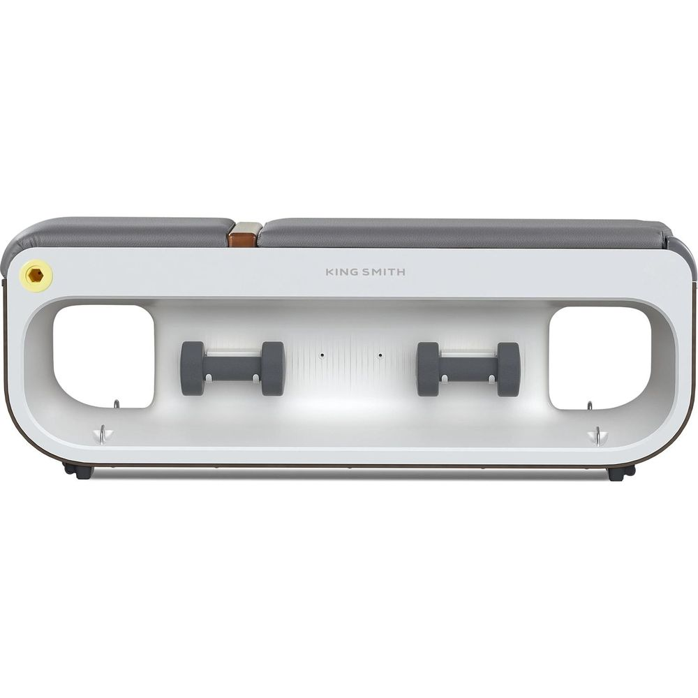 Biały sprzęt do ćwiczeń z dwoma hantlami i szarym siedziskiem.