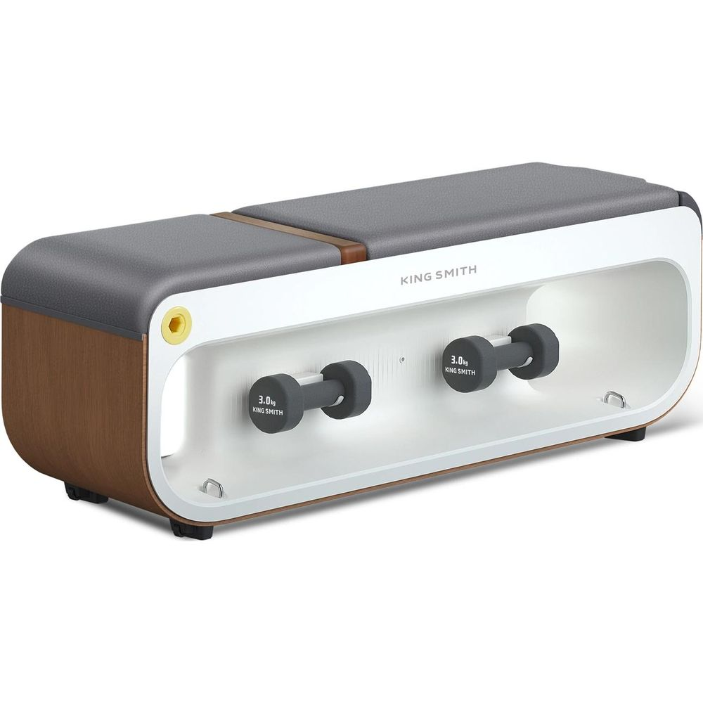 Ławka treningowa z dwoma 3-kg hantlami przechowywanymi z przodu.