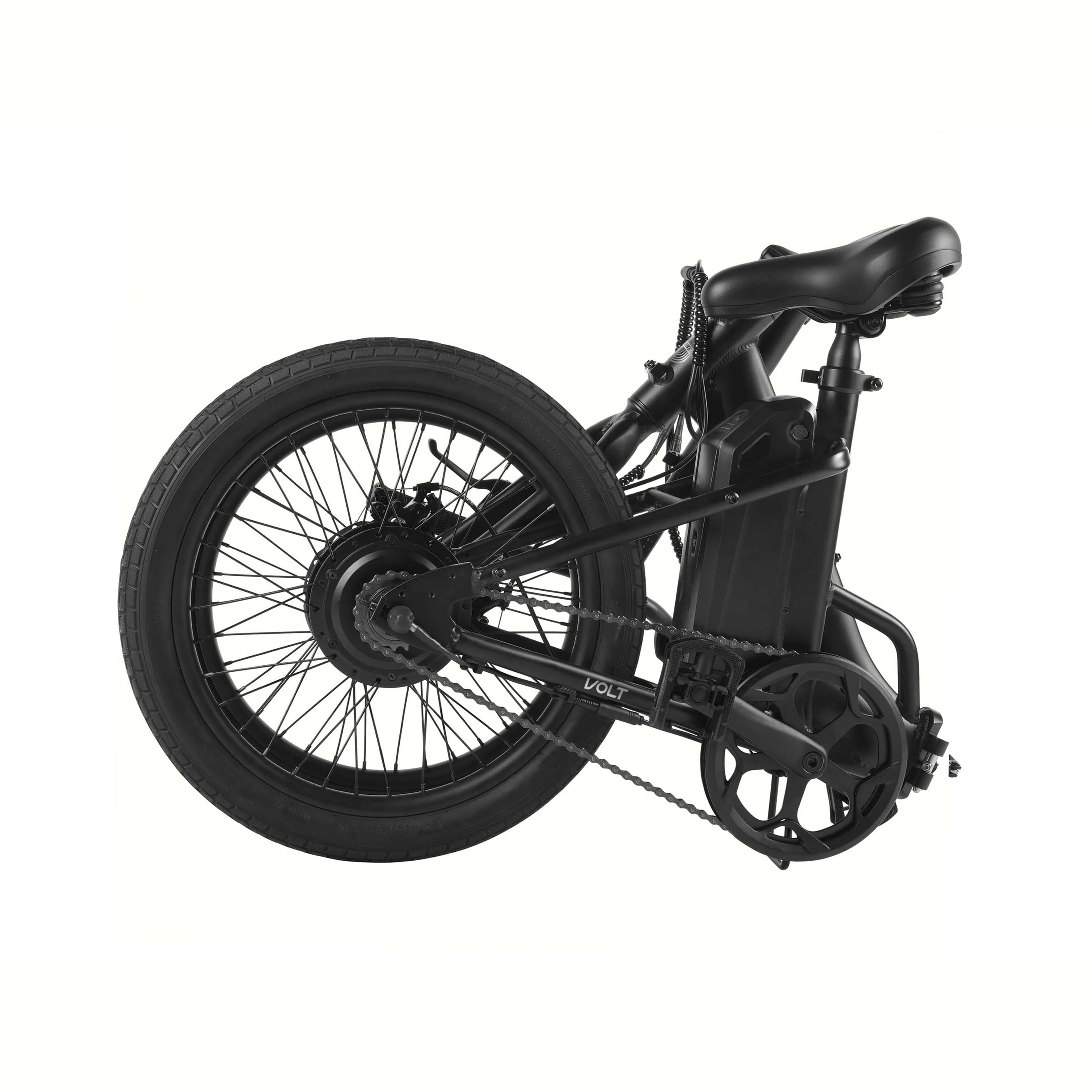 Una bicicleta eléctrica plegable negra con neumáticos anchos y batería visible.