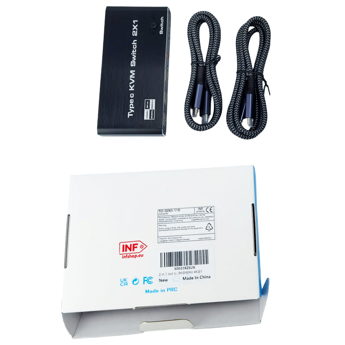 Ein schwarzer KVM-Switch mit zwei Kabeln und einer weißen Box.