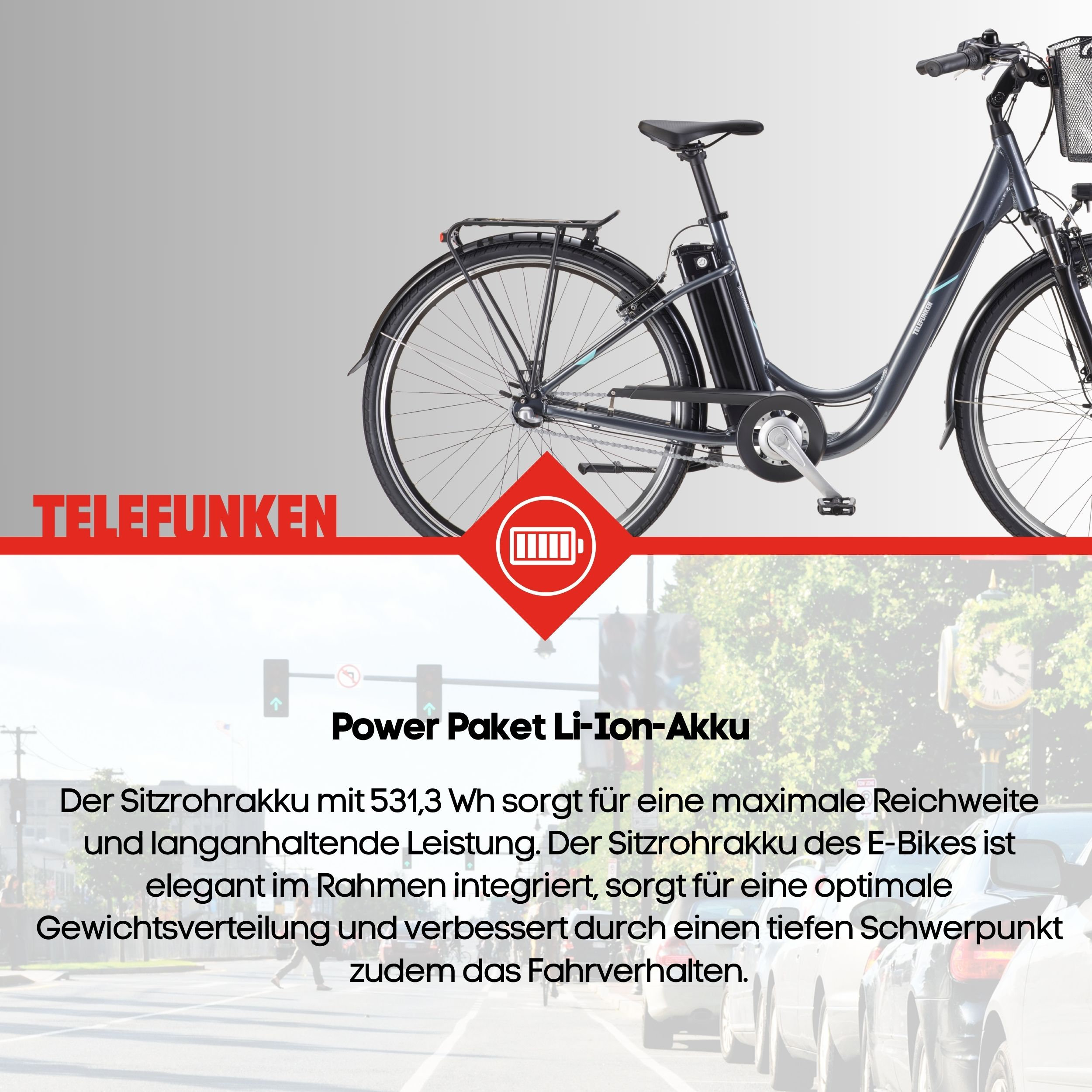 Dunkelgraues E-Bike mit Gepäckträger und Korb. Text über Akku.